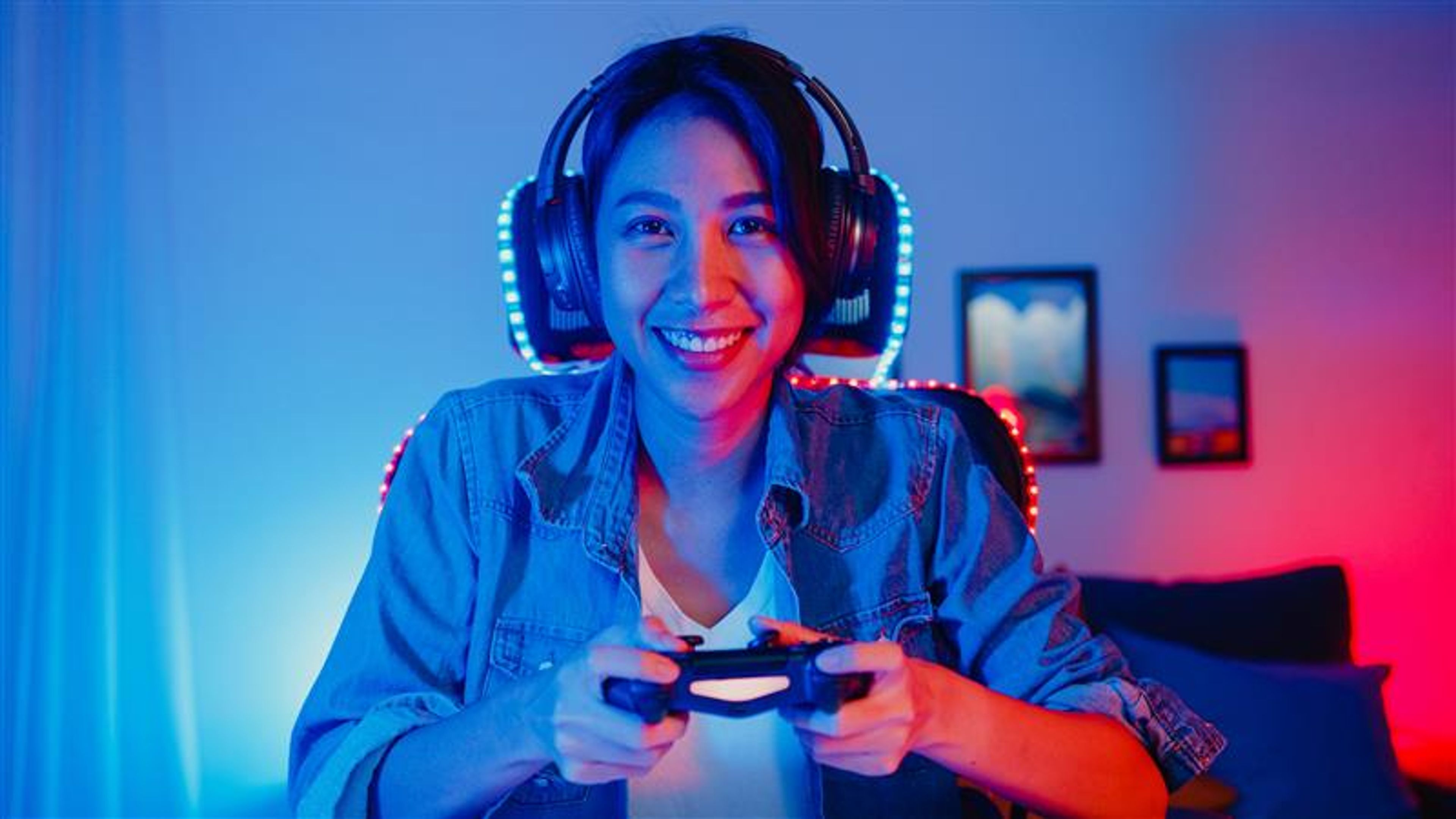 Happy asian girl gamer wear headphone set
