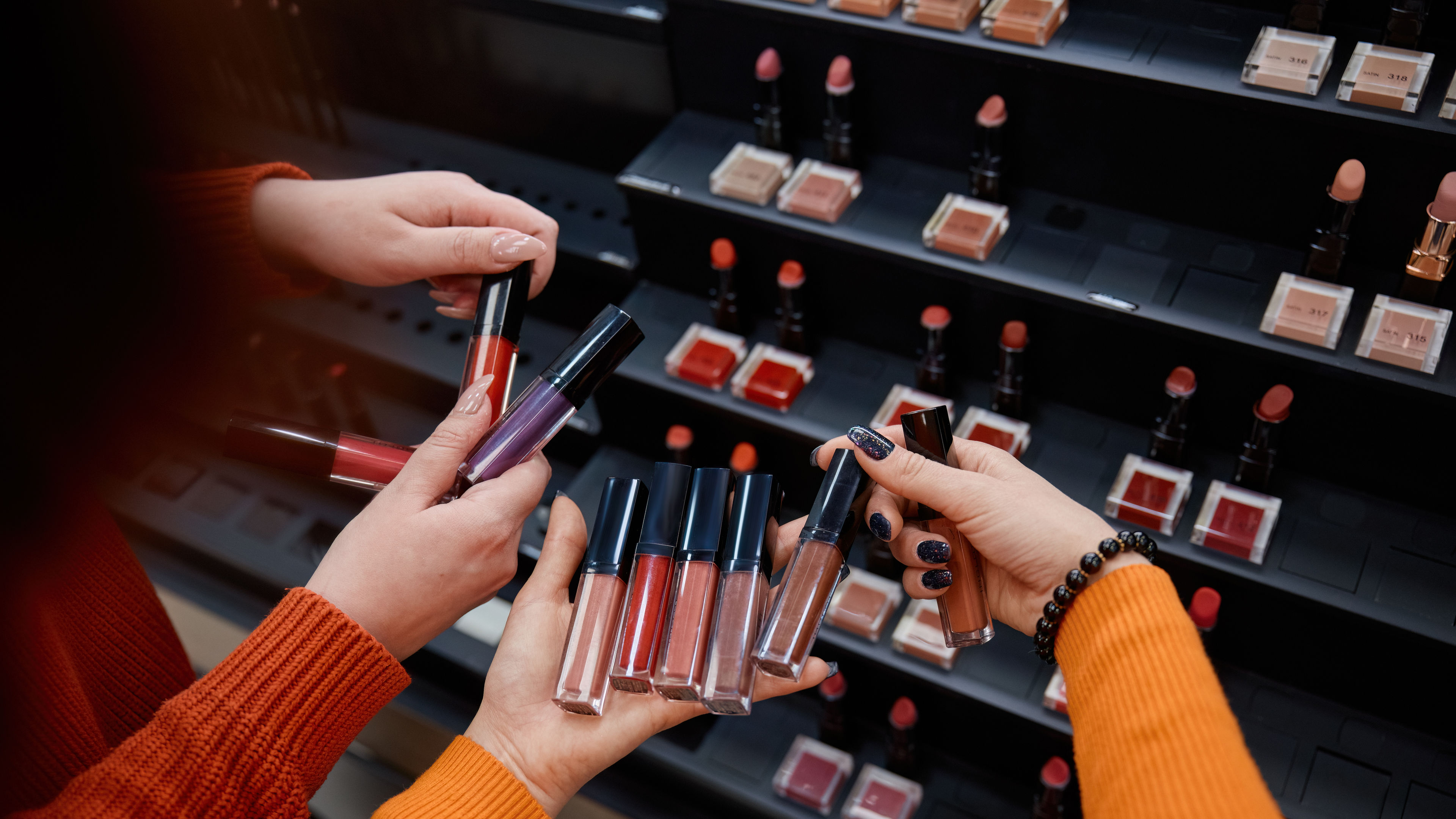 Lipsticks in hand