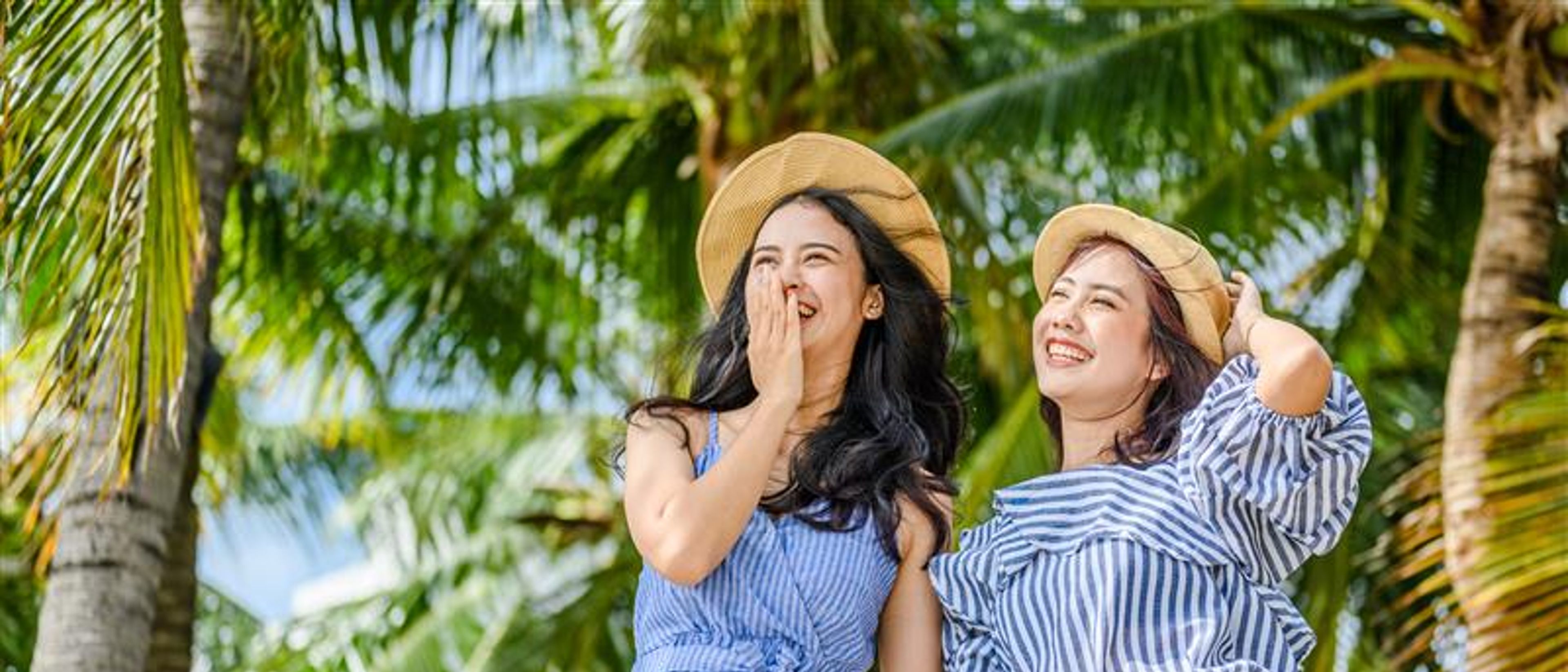 Women wearing hat at the beach