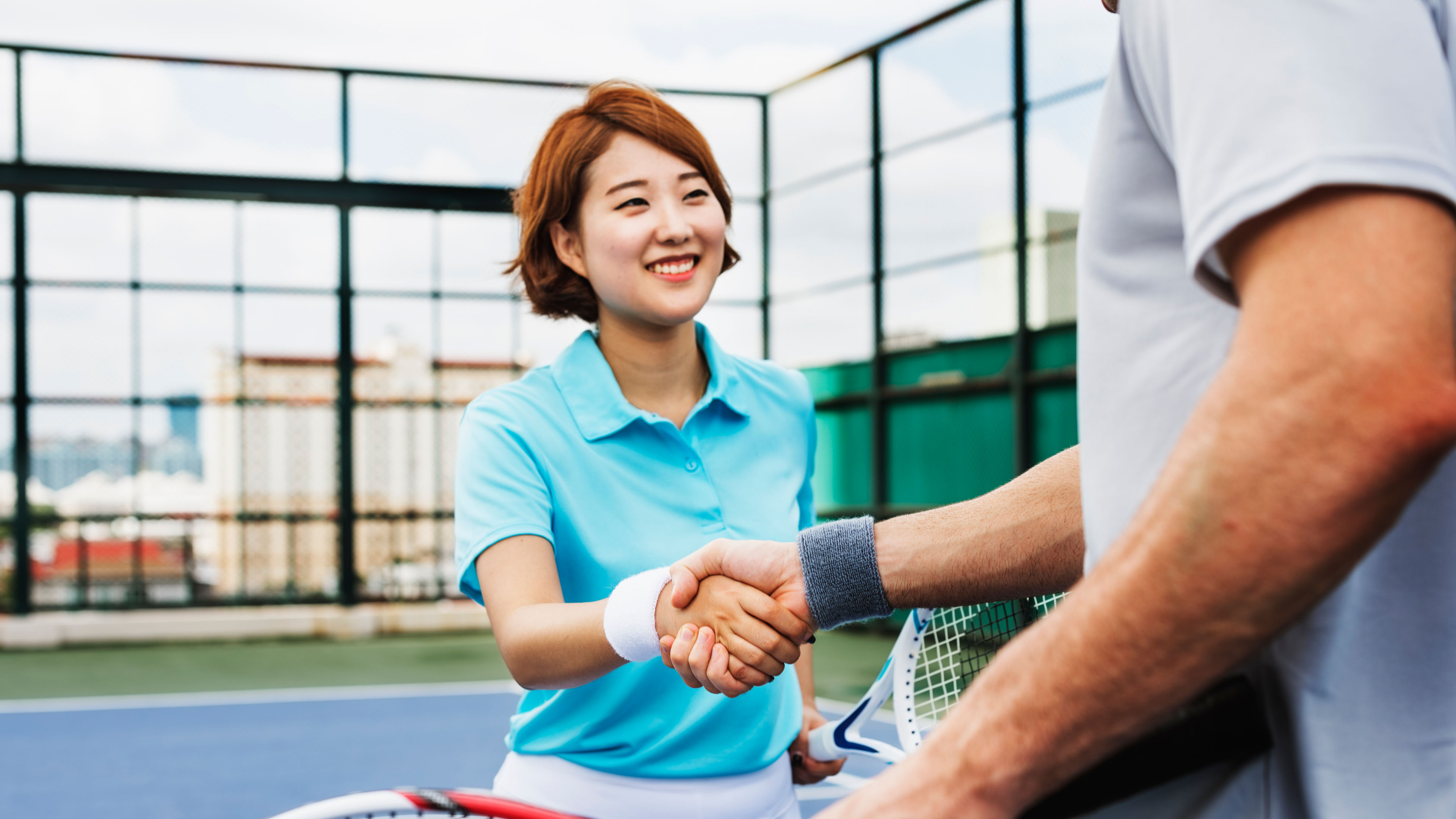 A woman on a tennis court