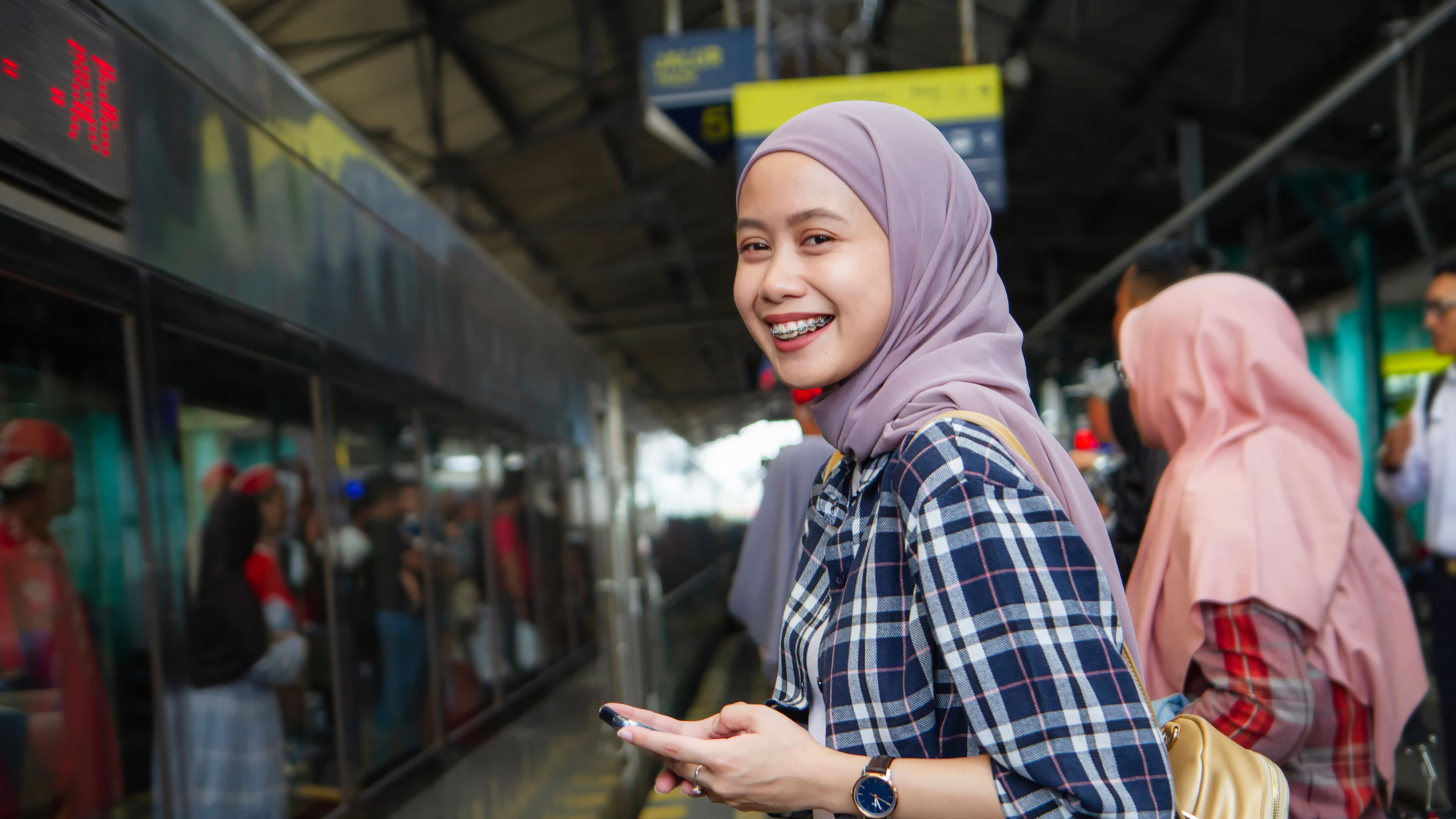 asian muslim women travel by train
