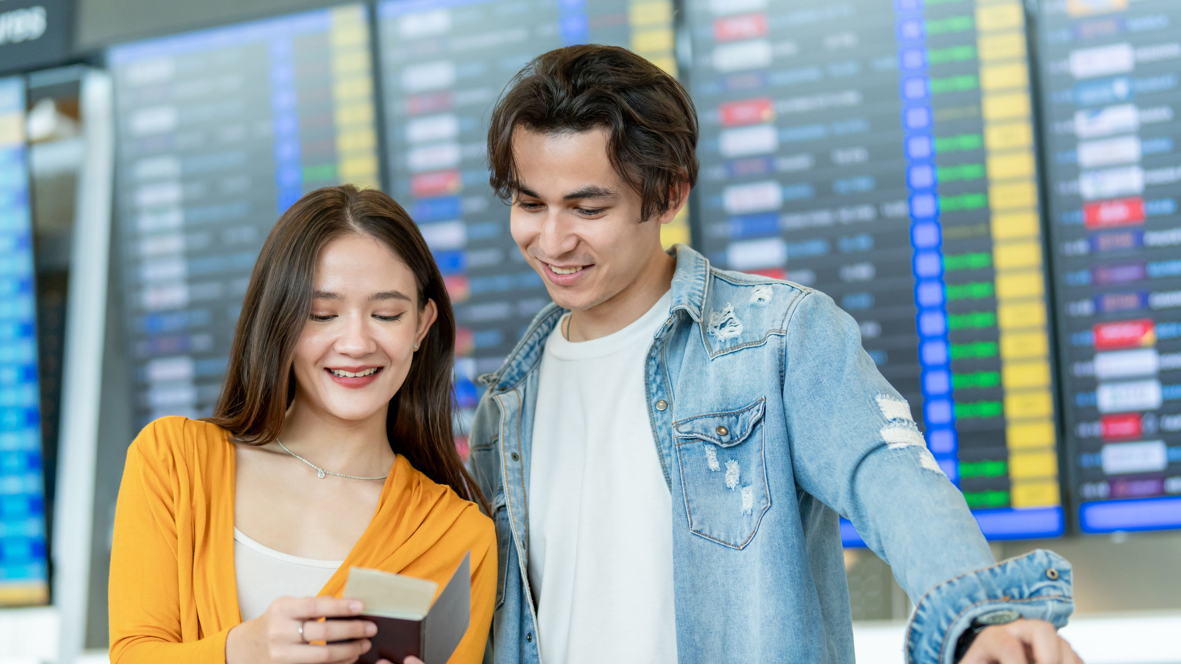 A couple looking at ticket