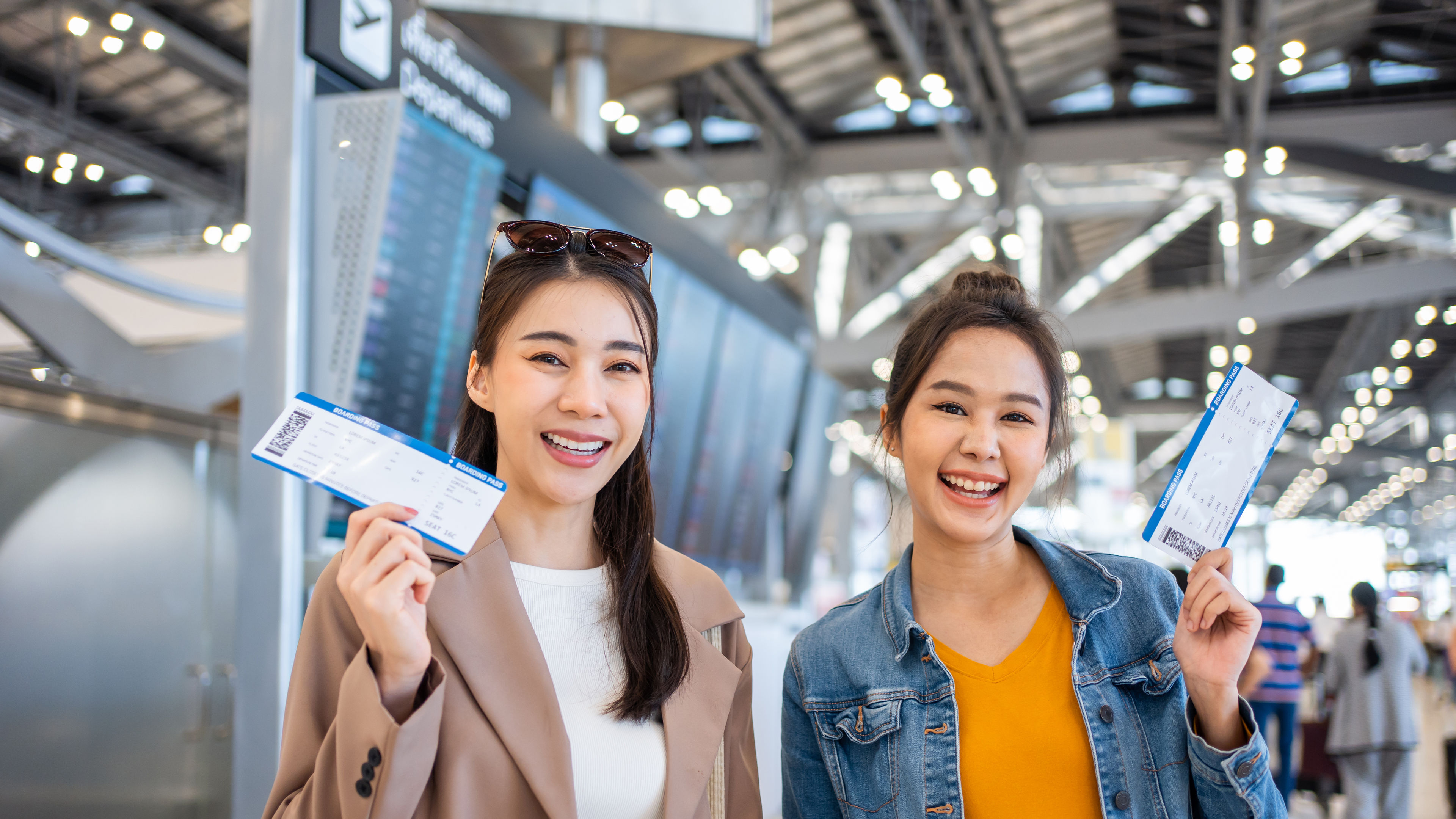 Women holding the tickets