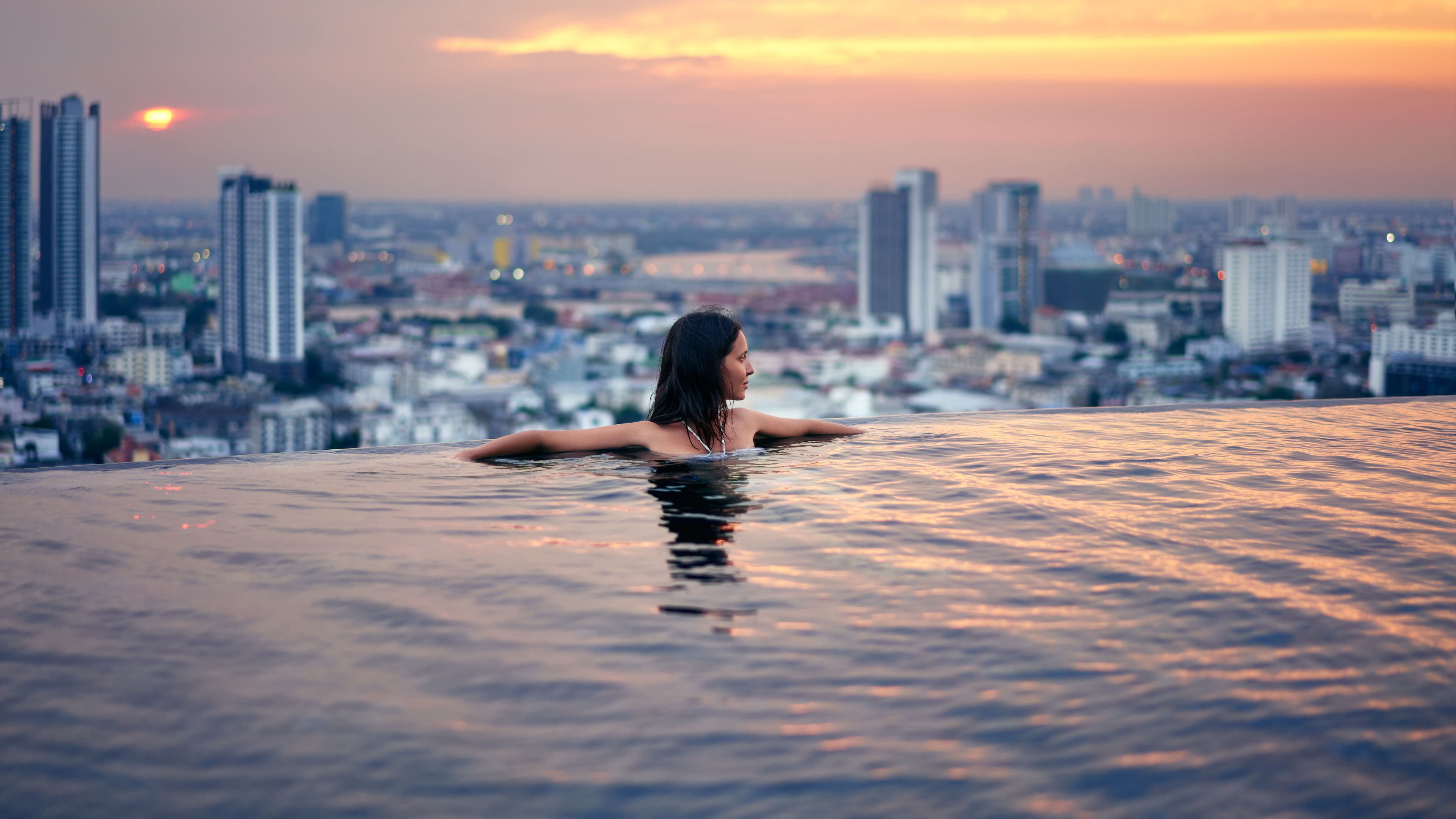 Young woman relax in swimming pool 
