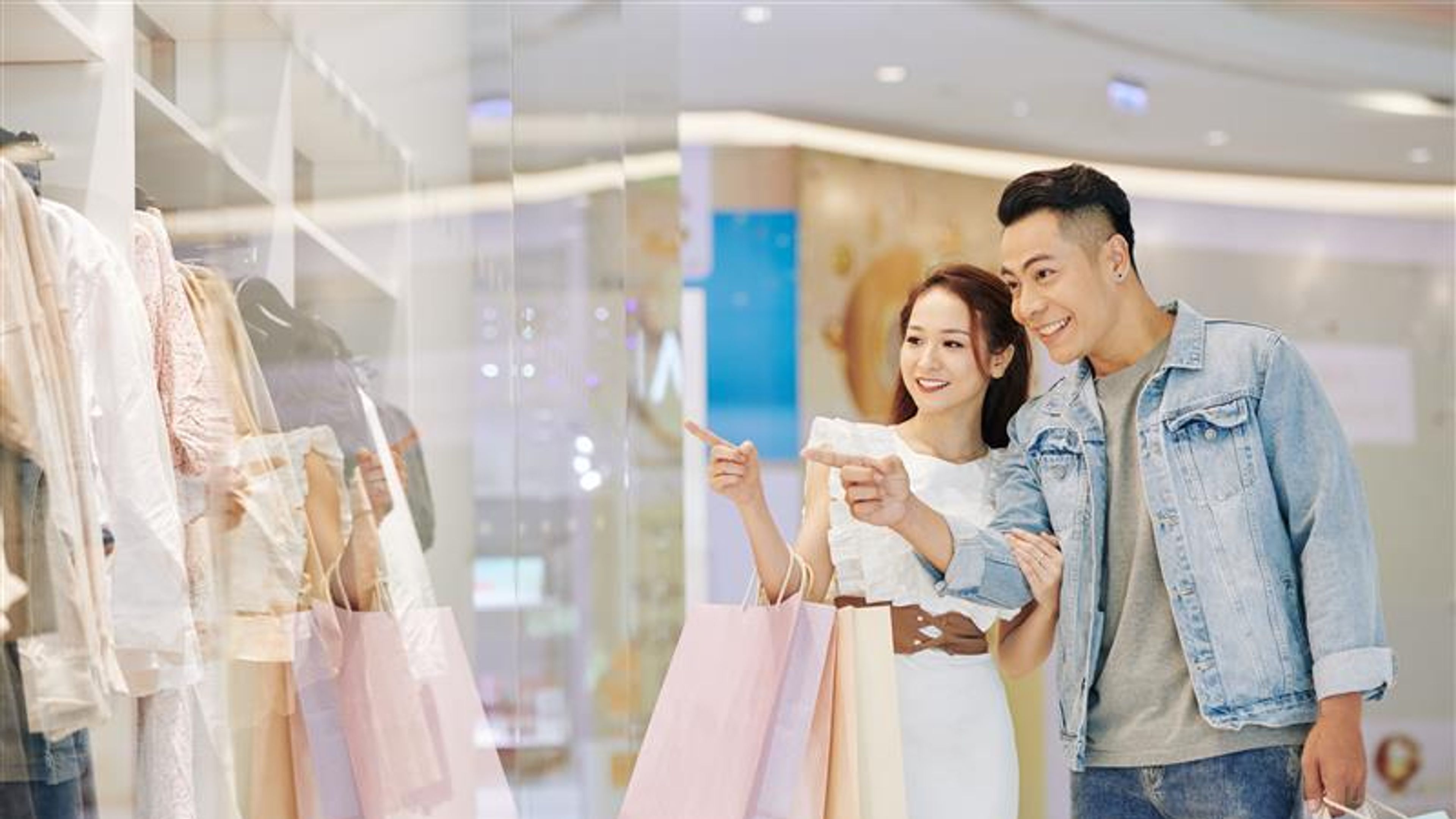 A couple shopping at a mall.