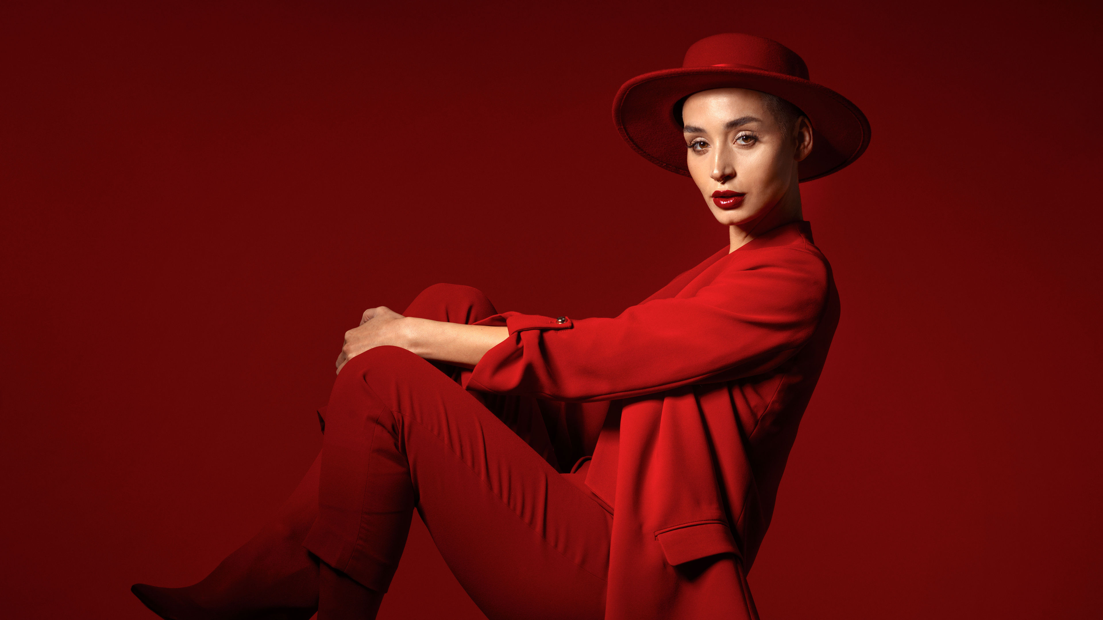 An Asian woman in red dress