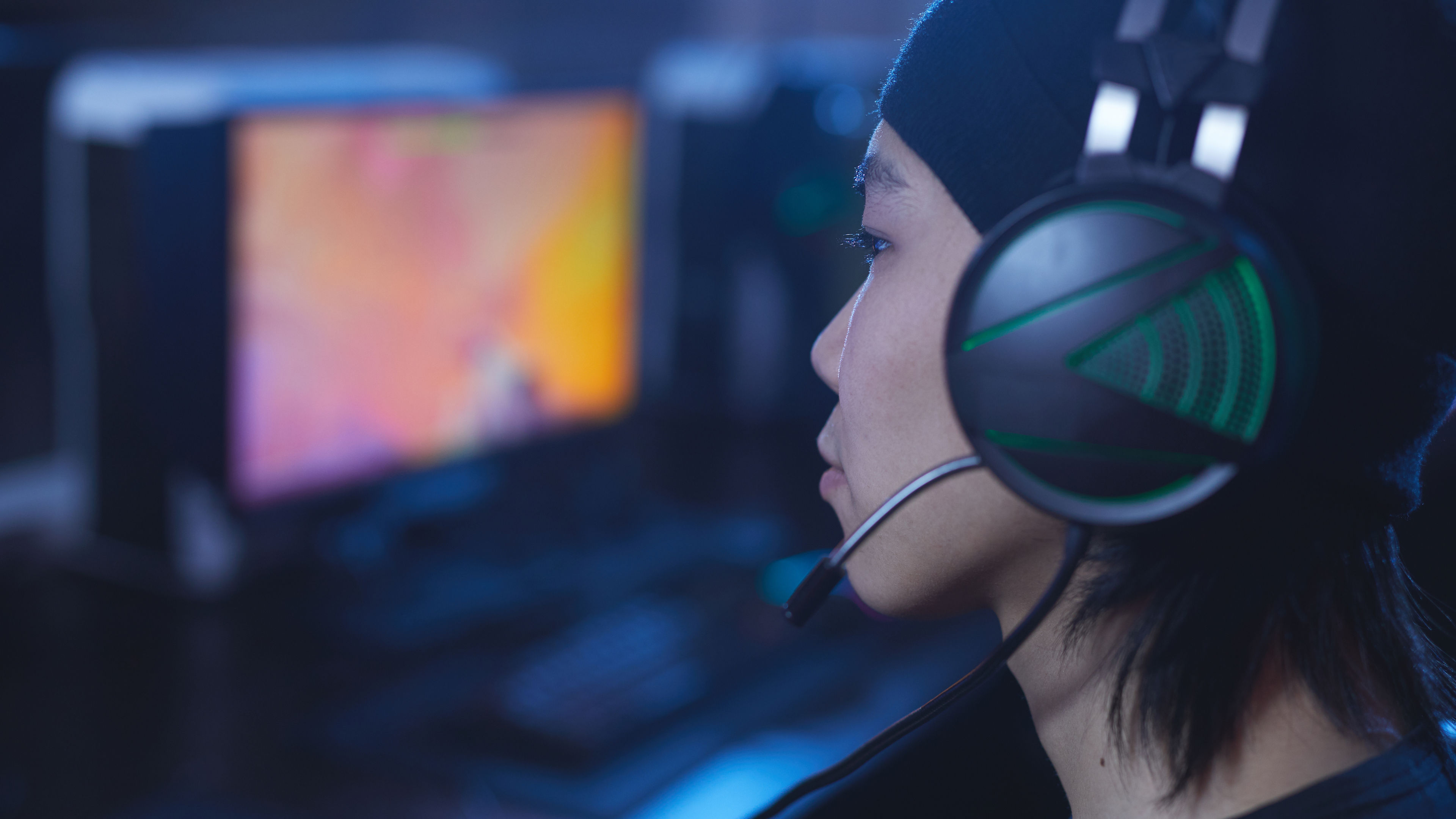 Asian Gamer Wearing headset