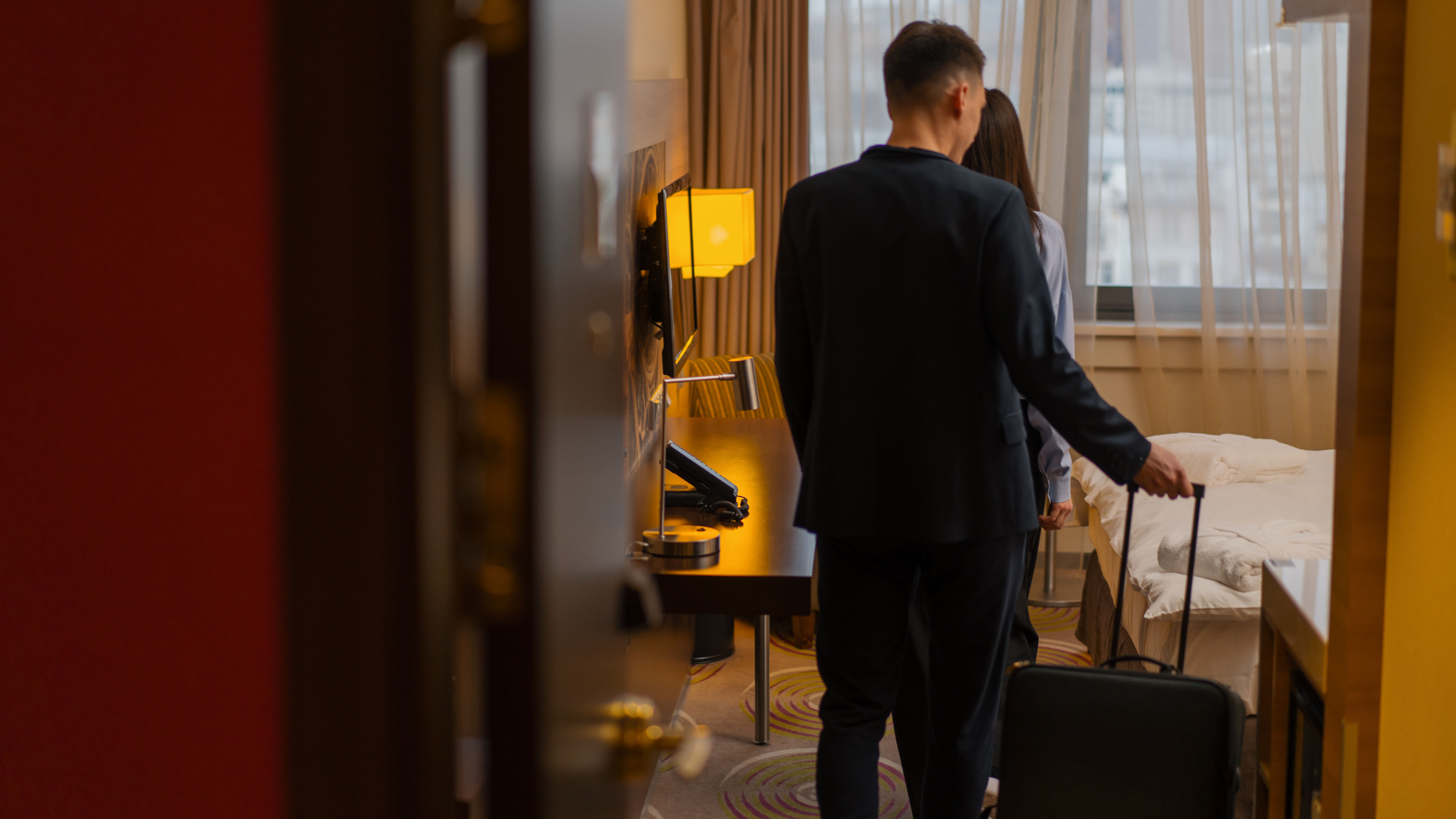 Couple came with Suitcase