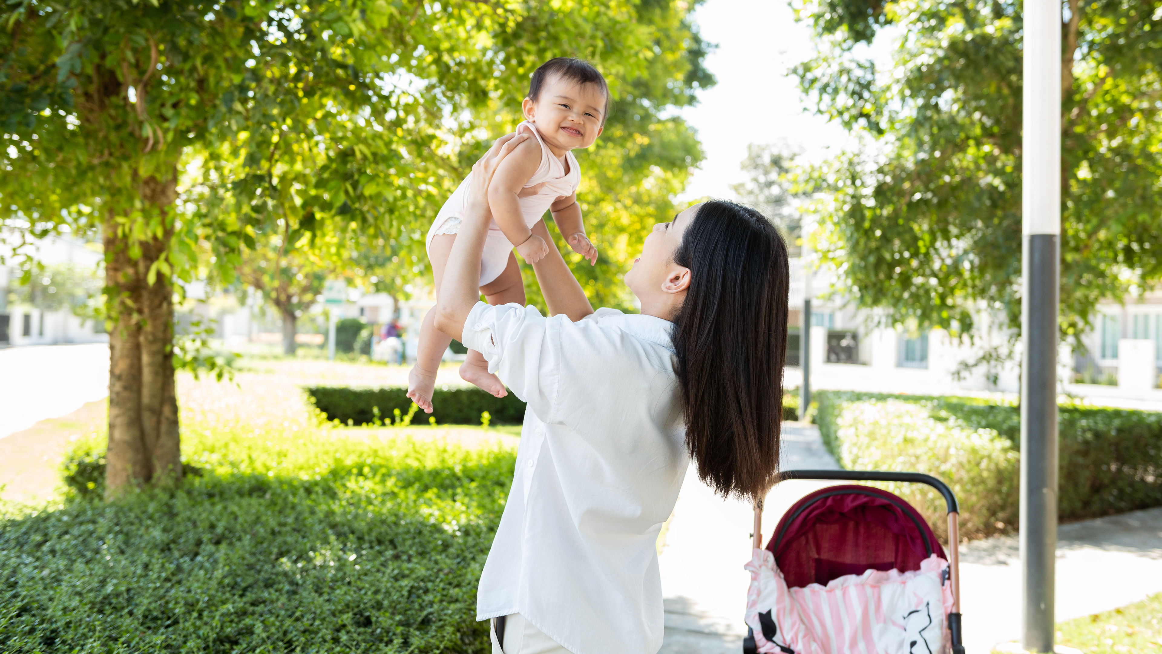 Mother with a baby in the park