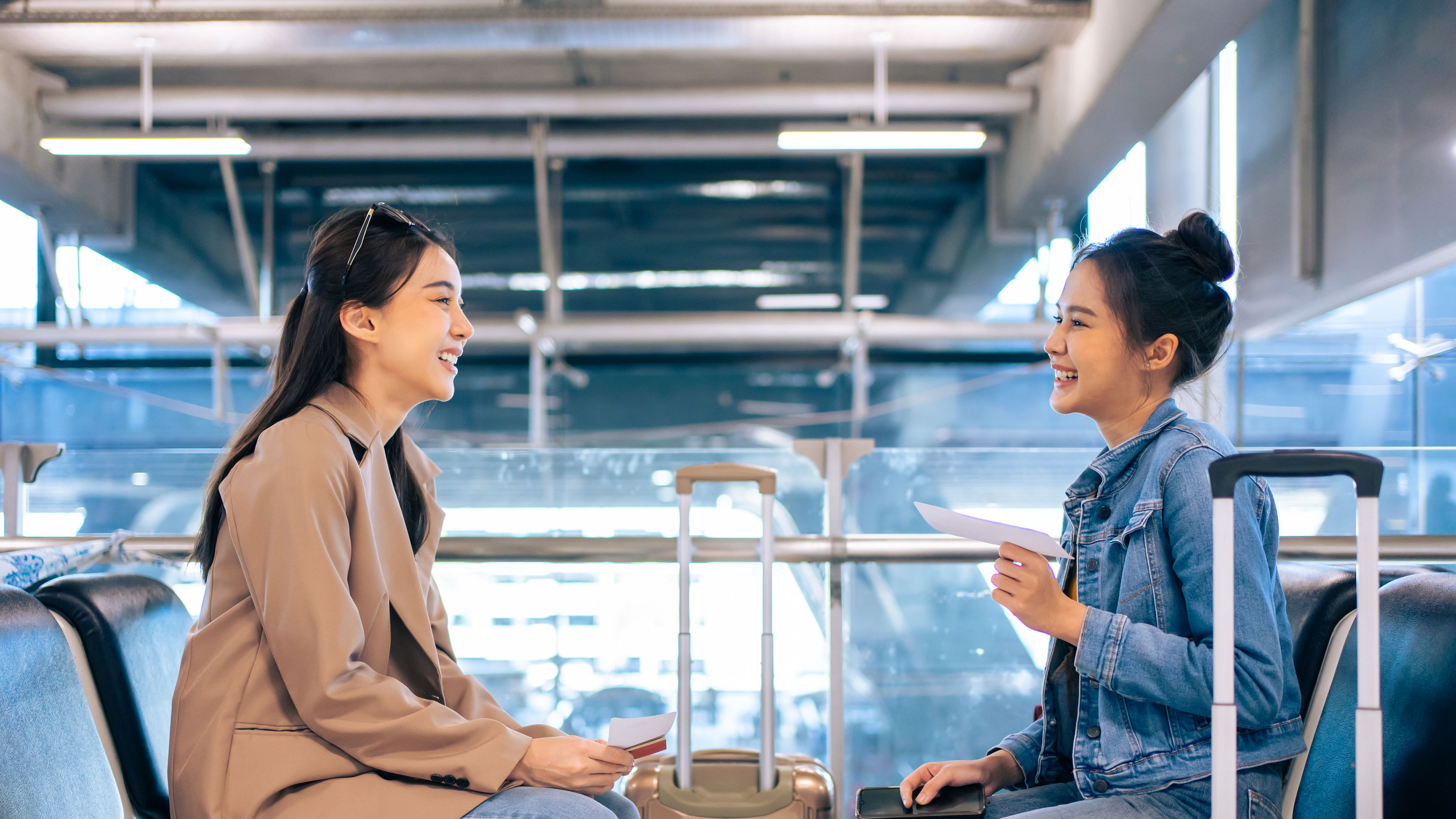 Two women are boarding a flight