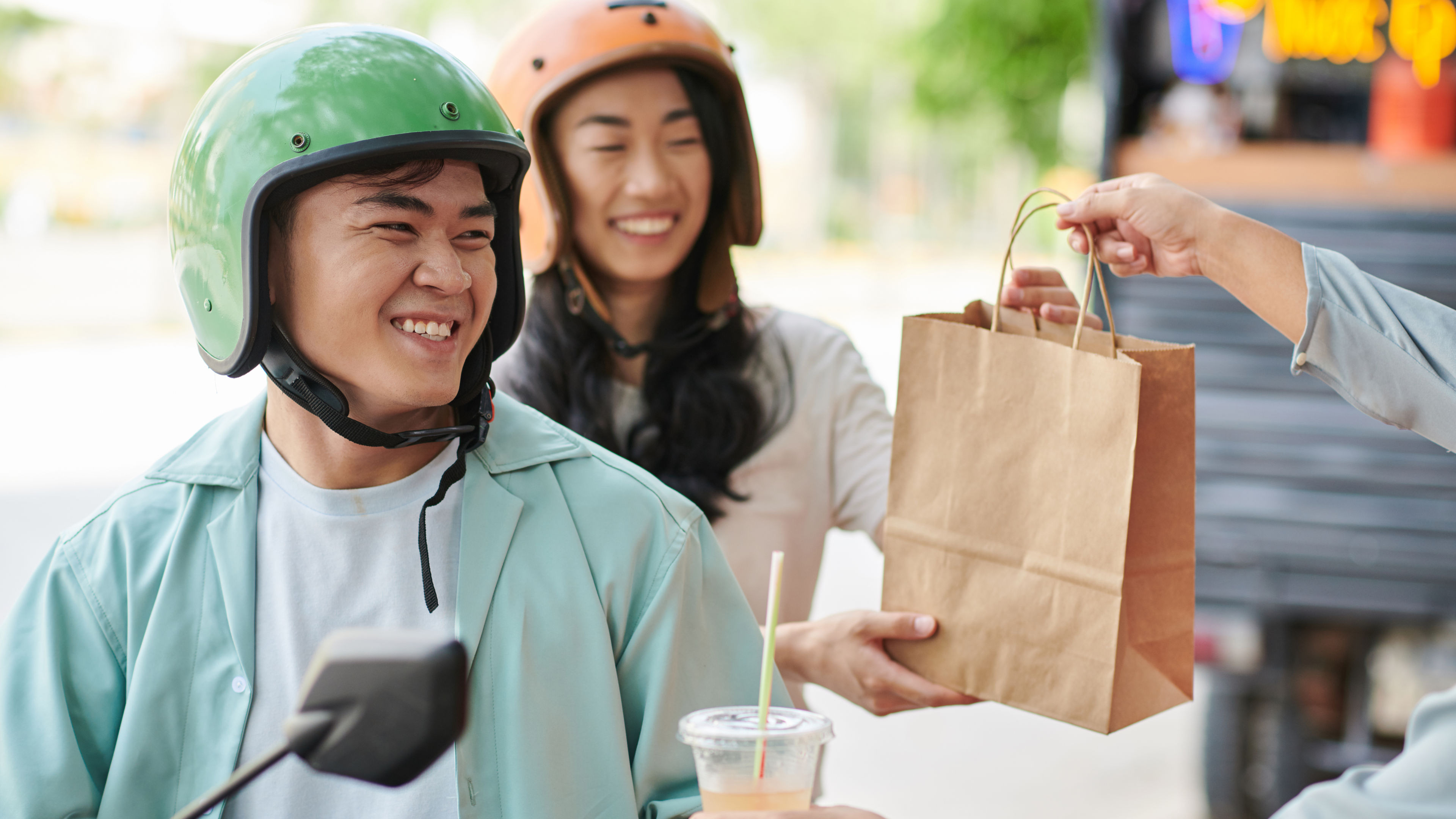 A happy couple taking food order 
