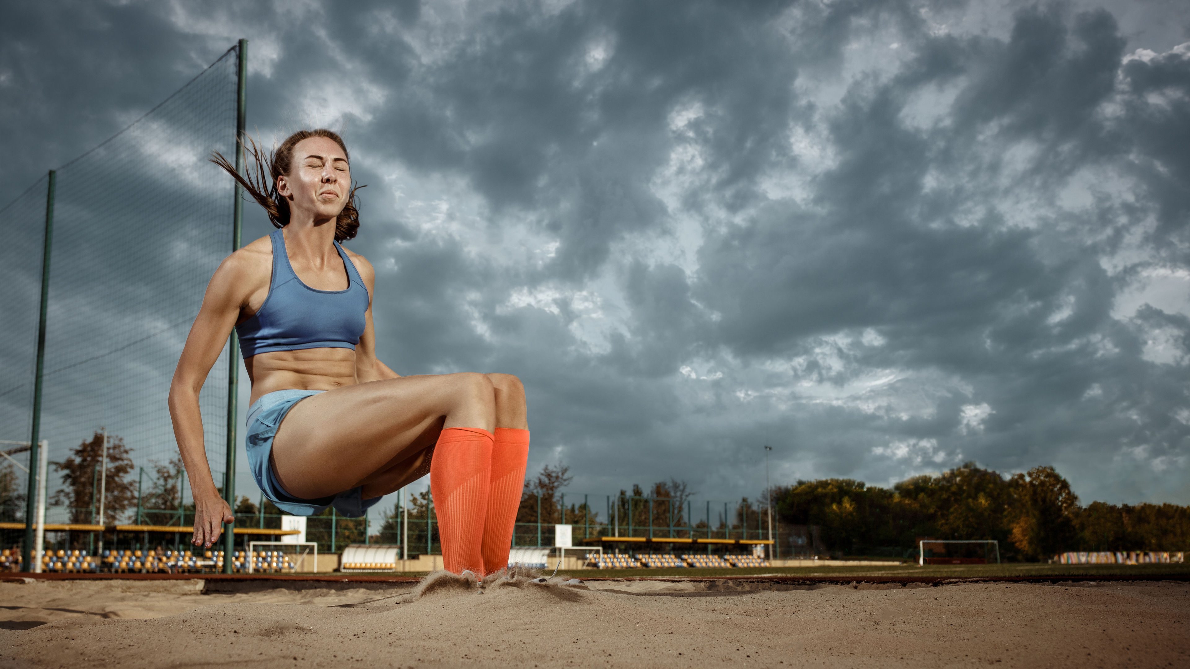 An Asian woman in sports apparel