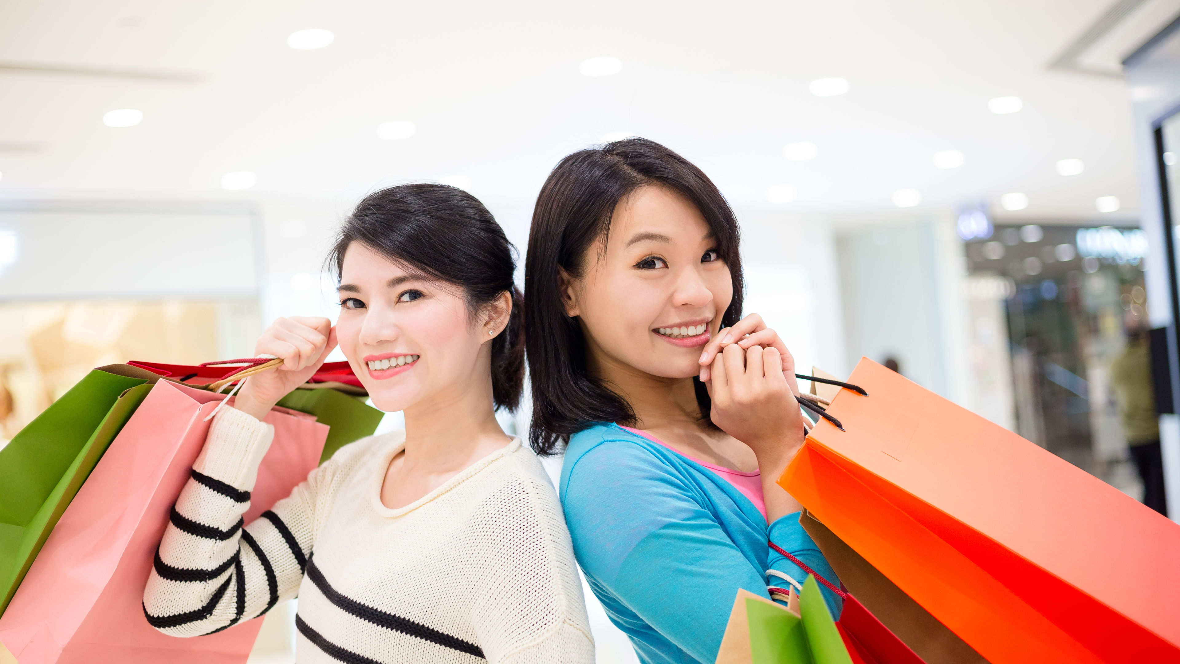 Friends shopping at mall