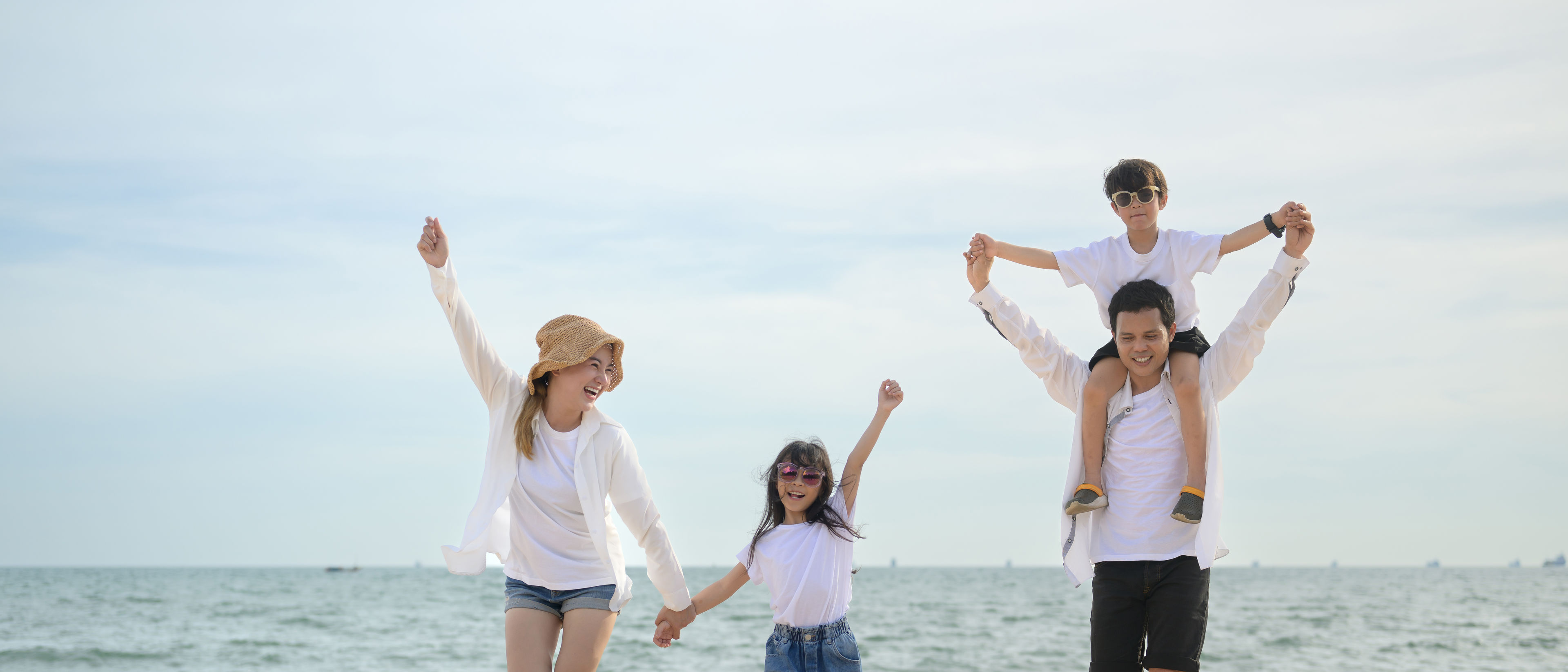 Happy family on a beach.