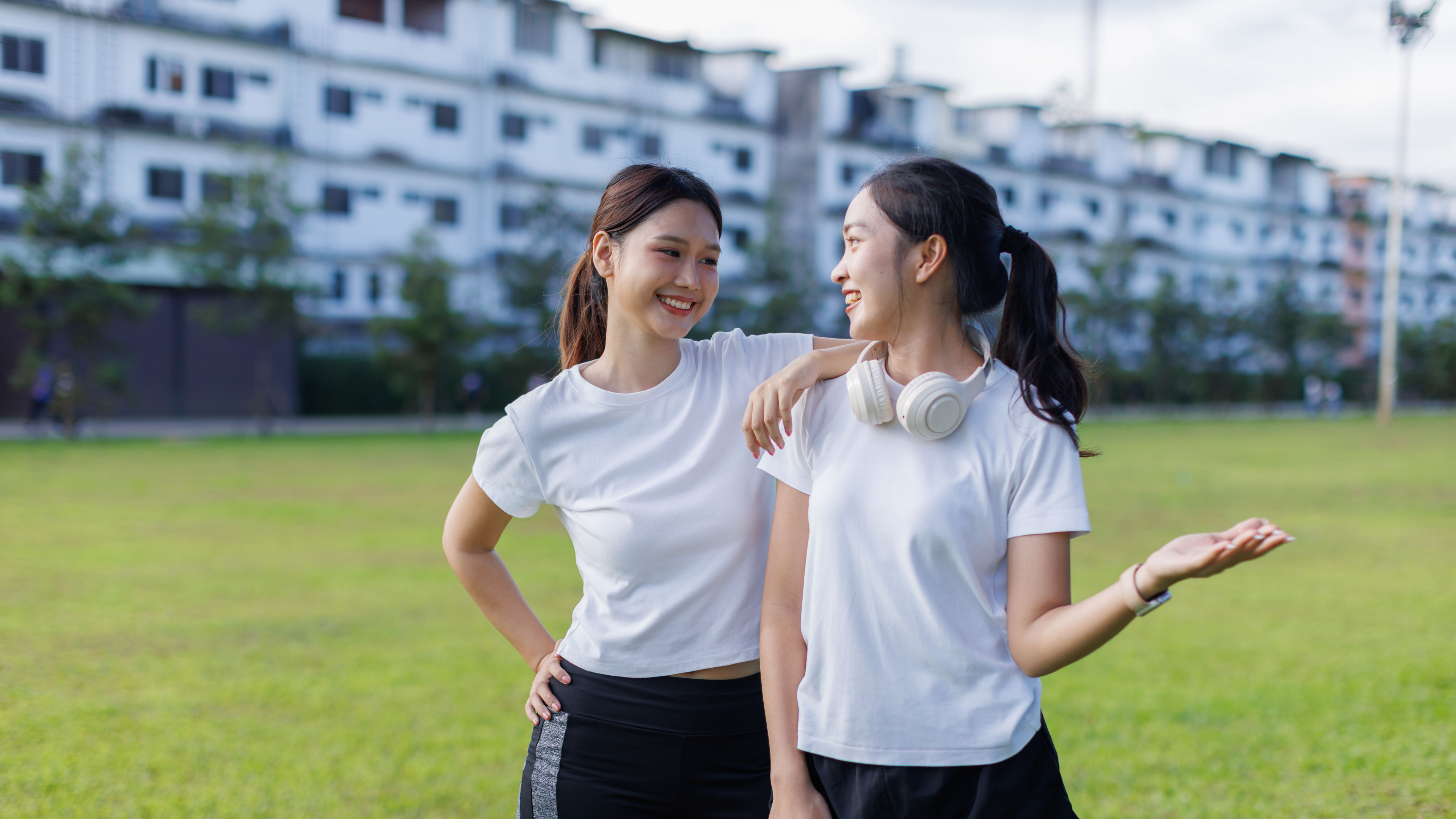 Two girls in sports dress 