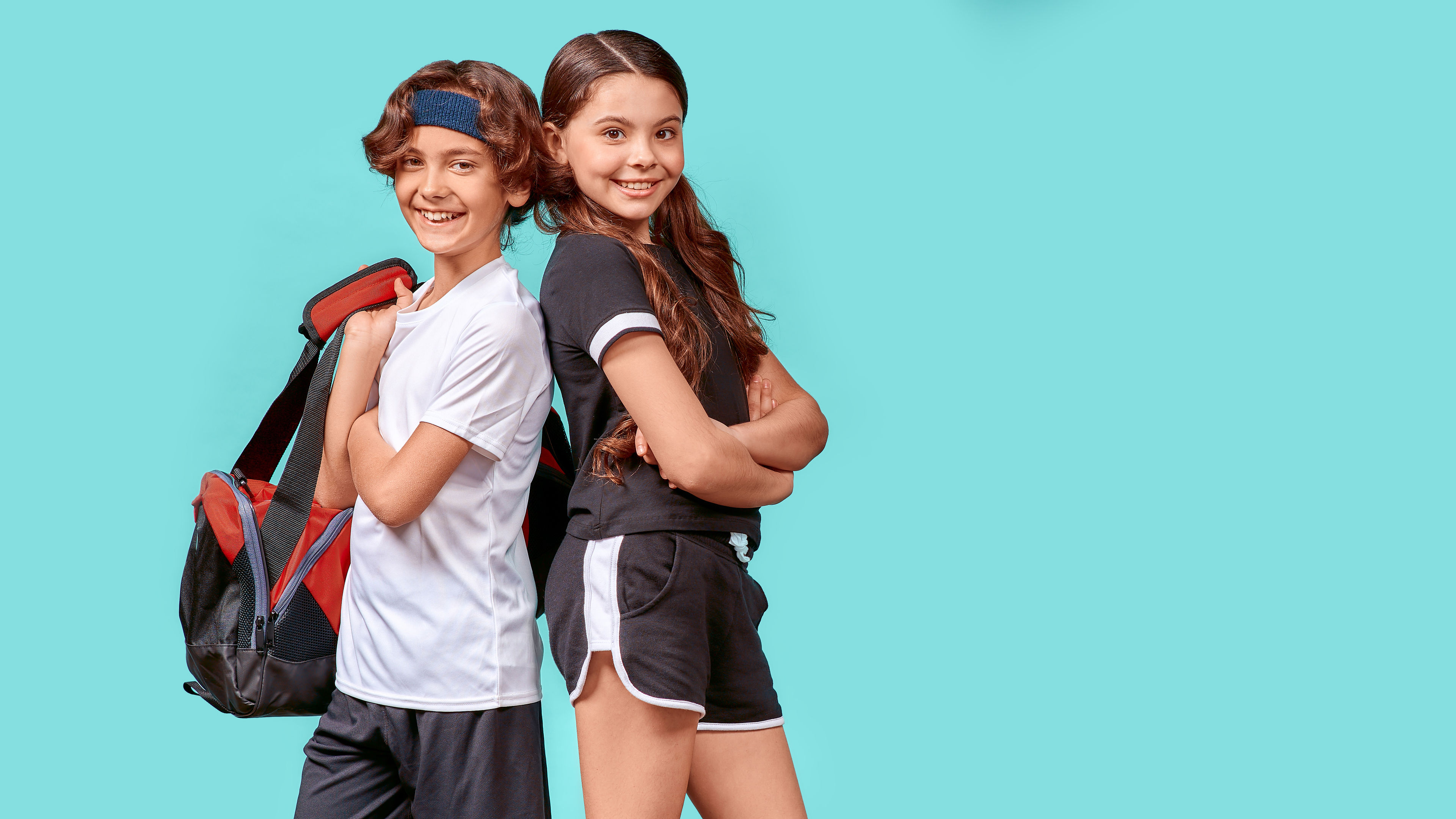 Two teen in sports dress 