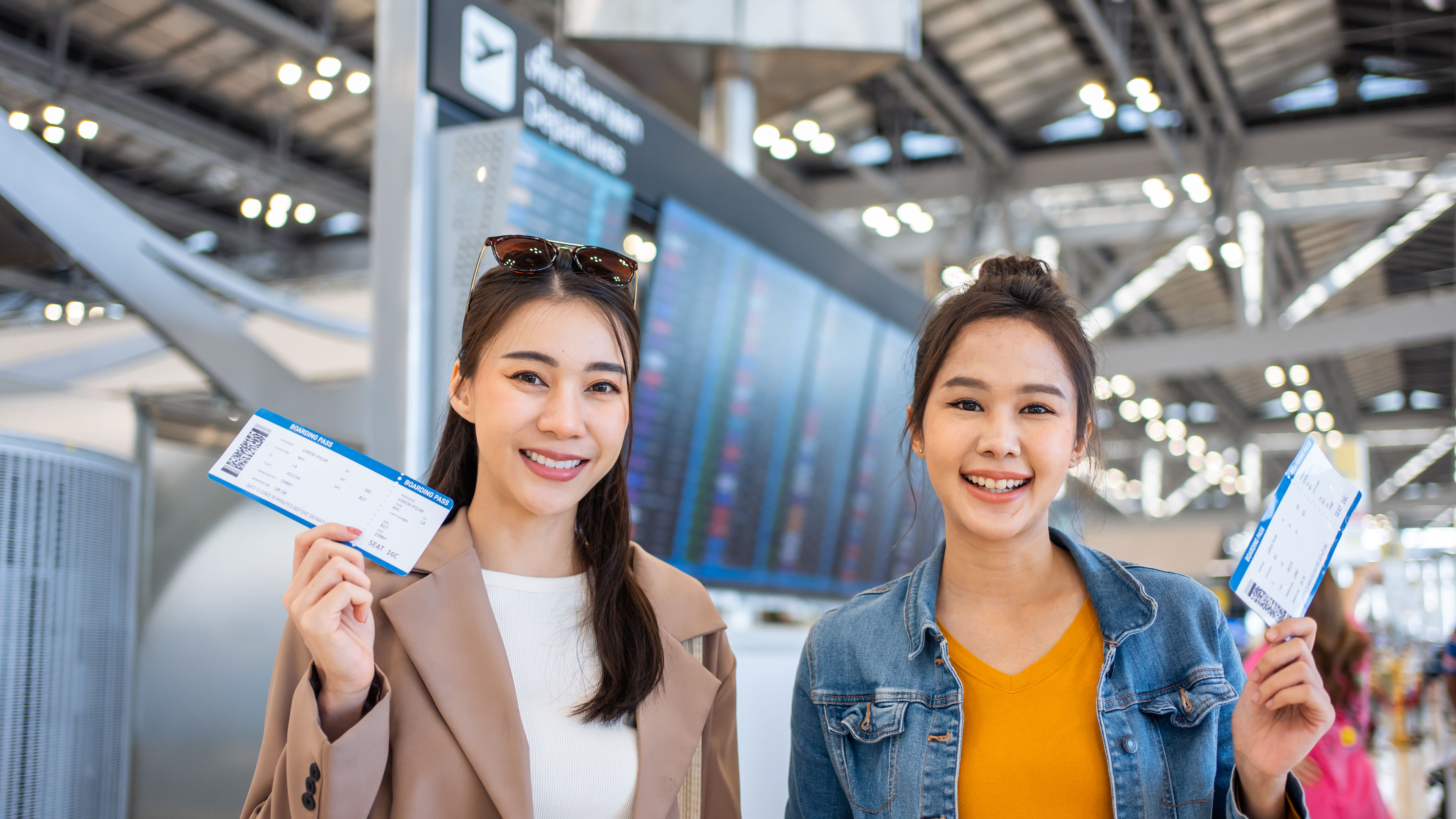 Two woman with tickets