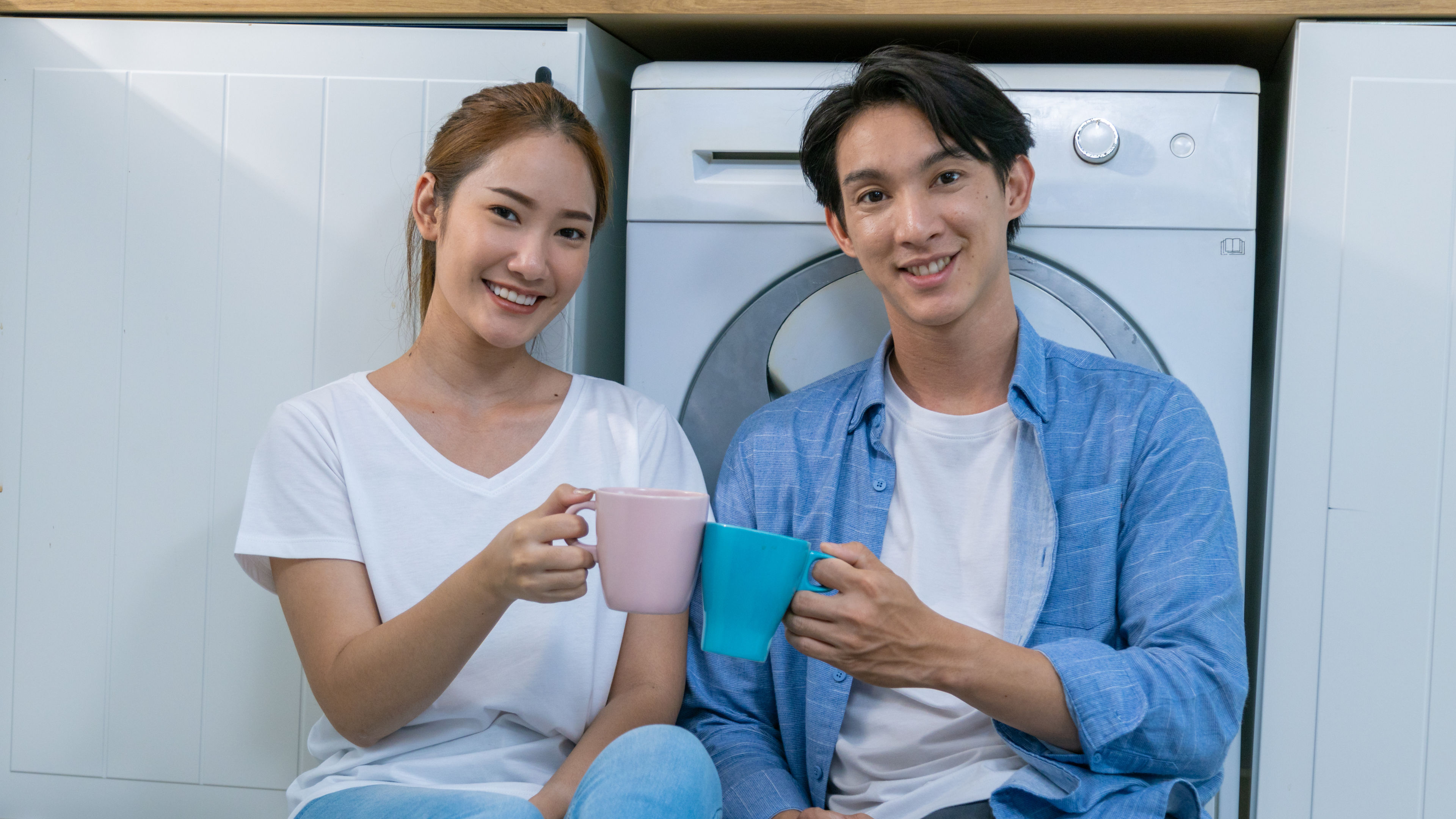 young couple happily makes breakfast and sweet treats together