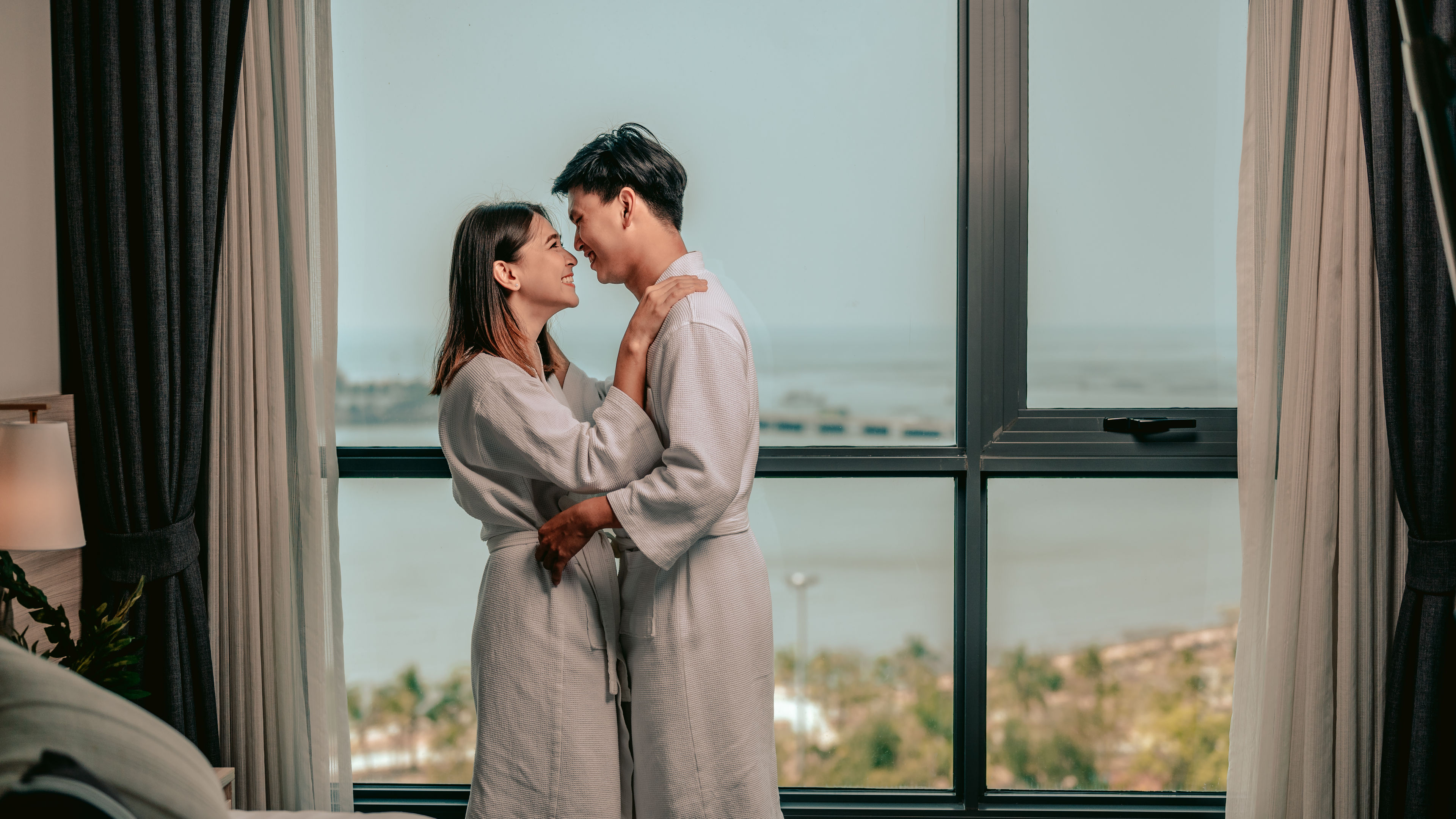 Asian couples in hotel room