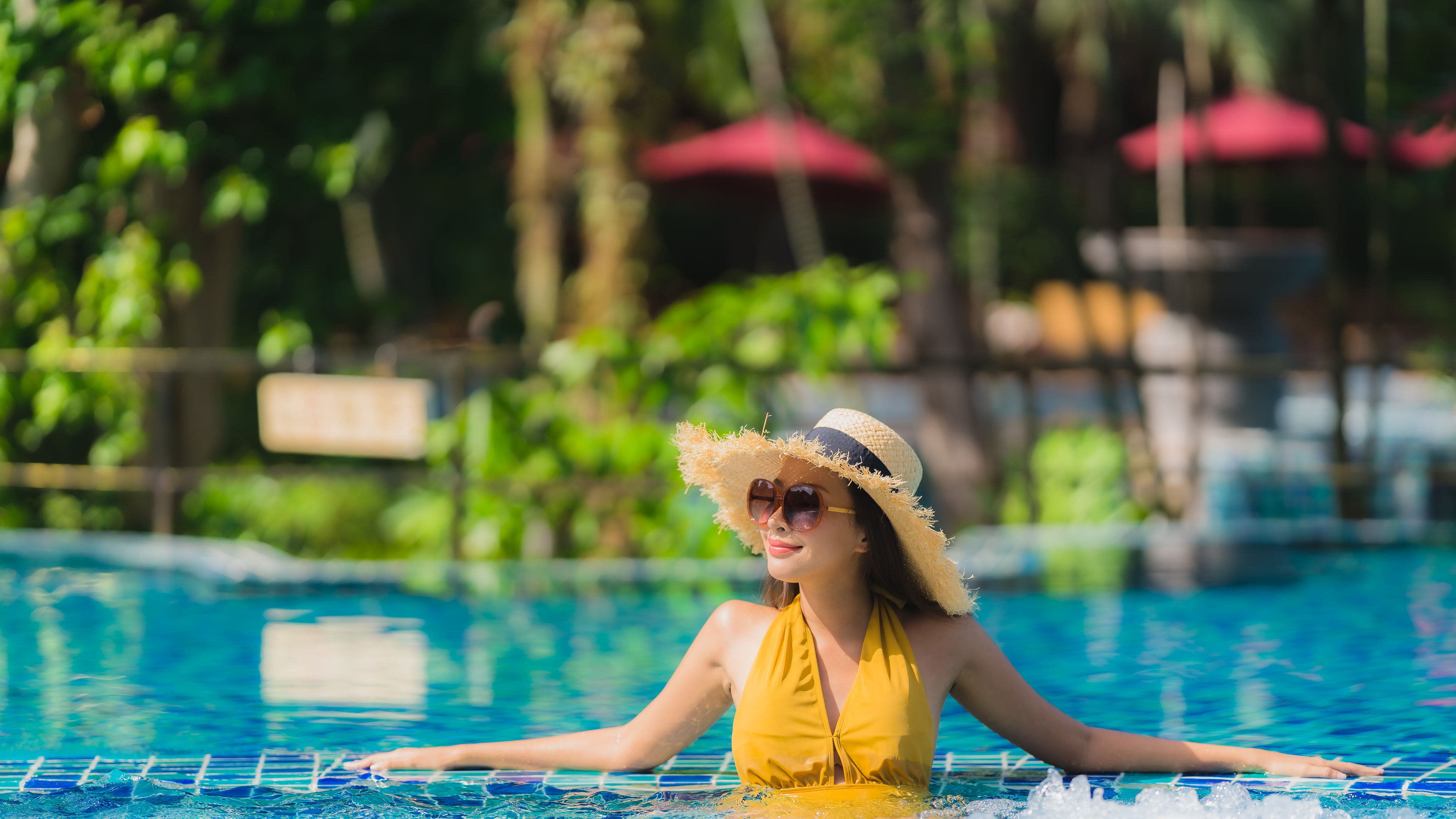 Young woman relaxing in pool