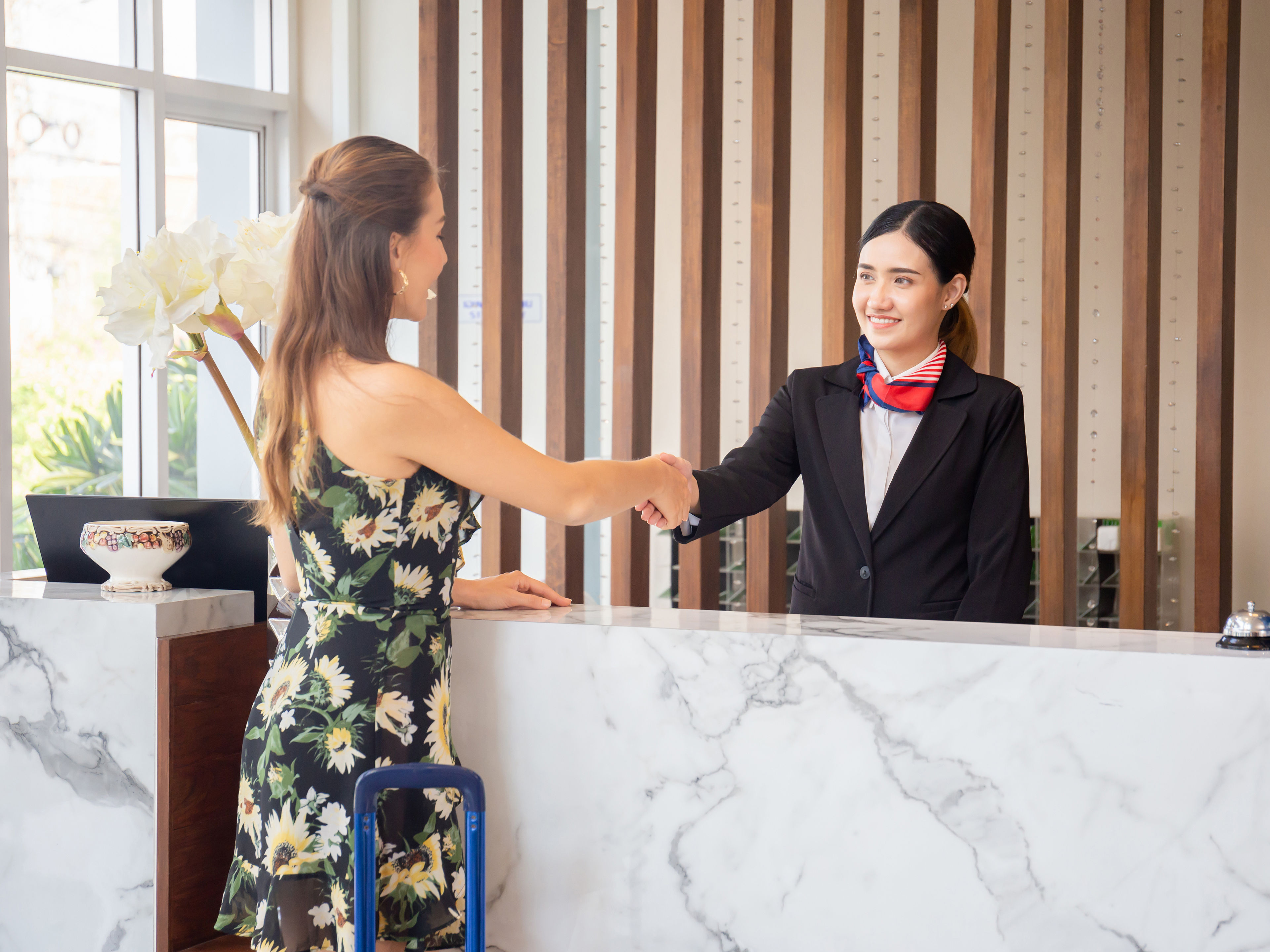 Receptionist welcoming the guest 