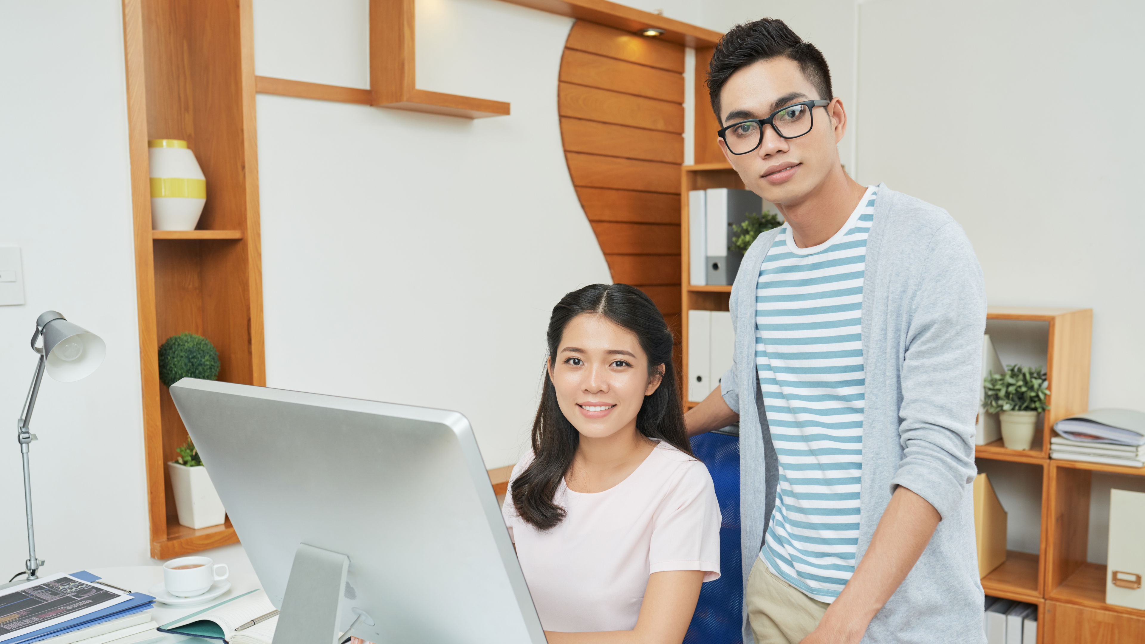 Professionals working at office