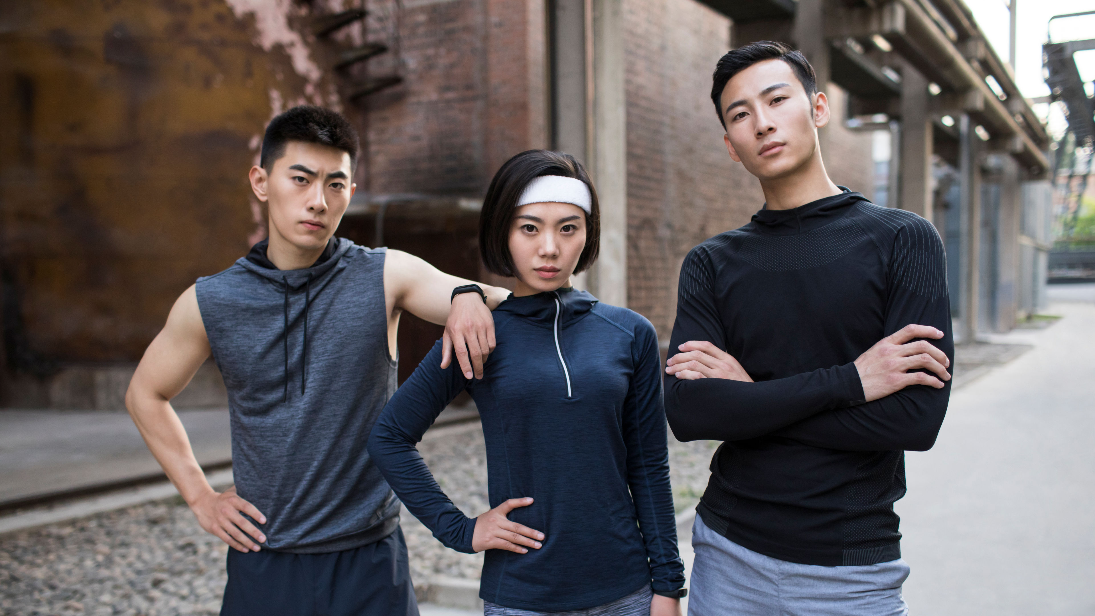Young Asians friends exercising outdoors 