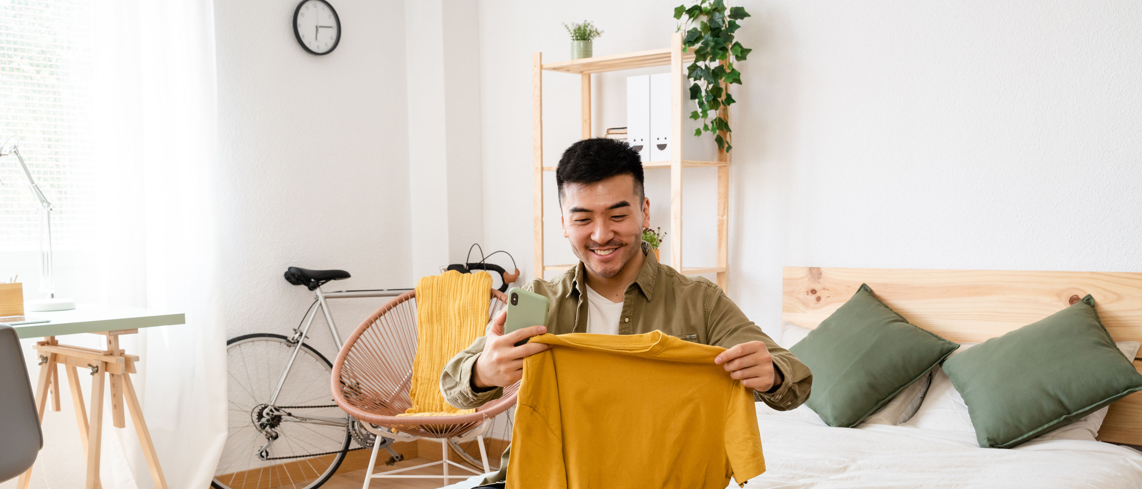 Young man choosing clothes
