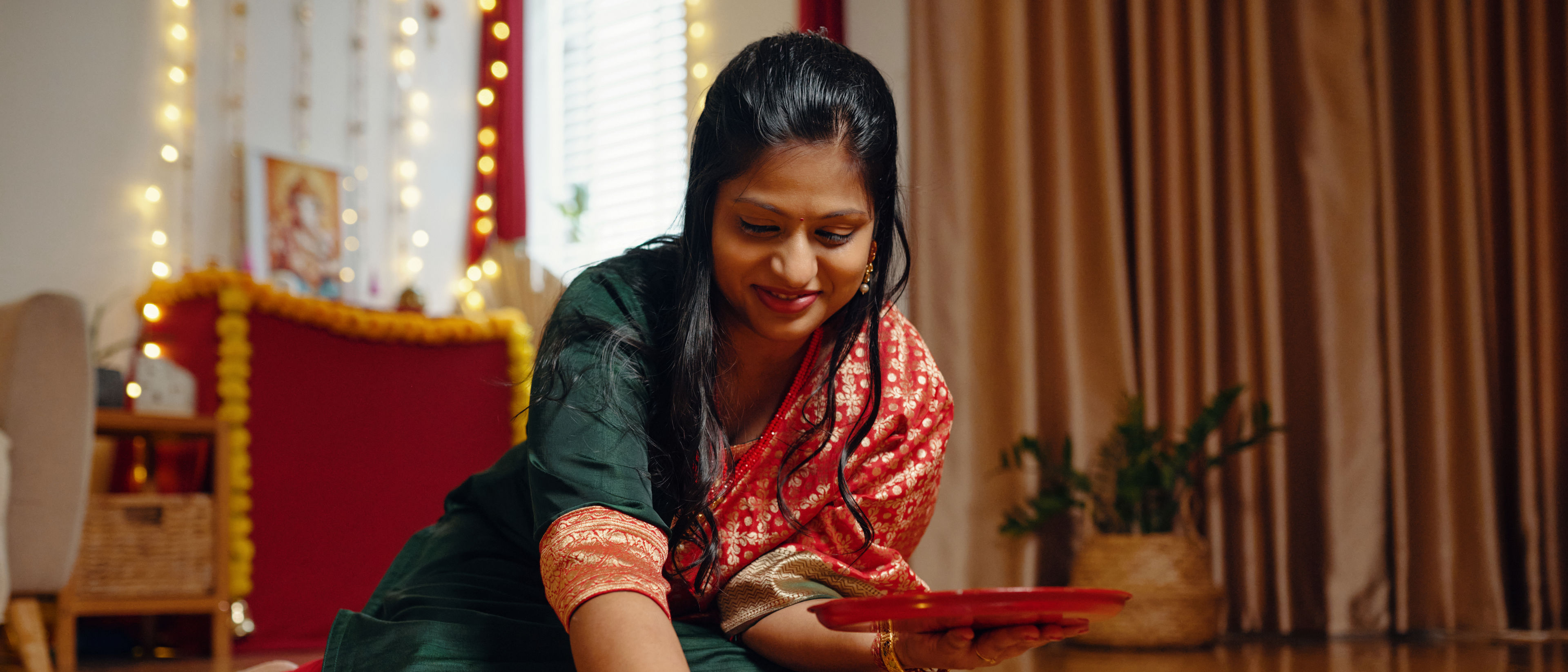 Woman decorating home for celebration