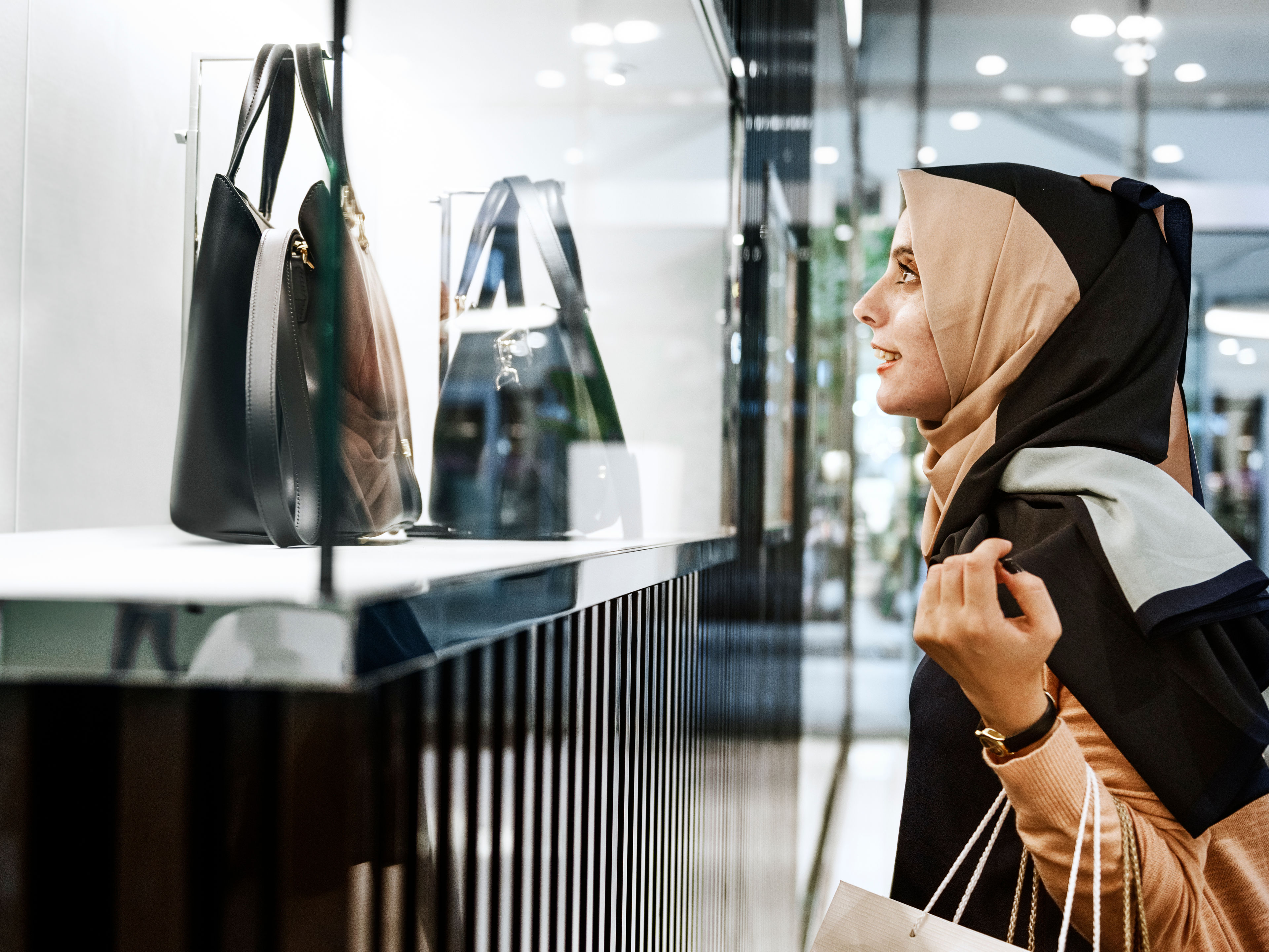 A woman looking at bags