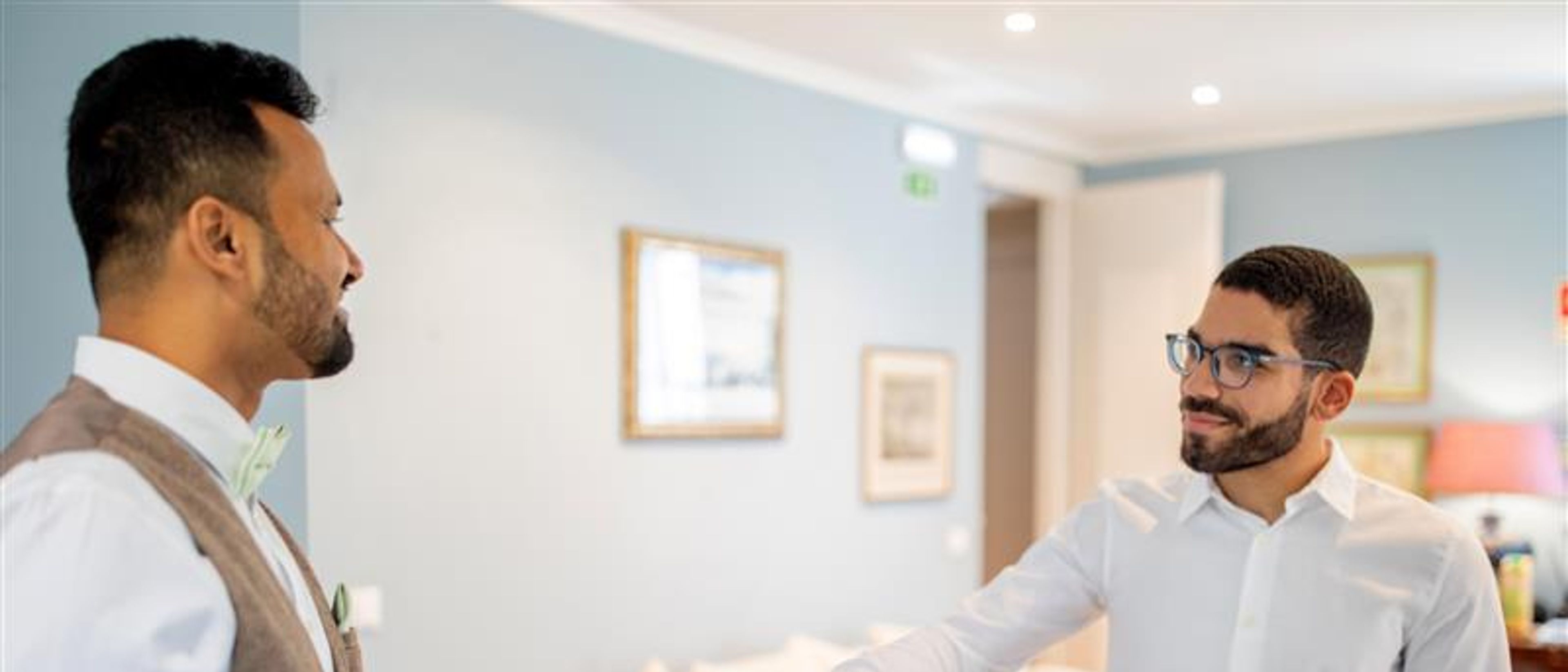 Customer making a payment at the hotel reception desk during daytime