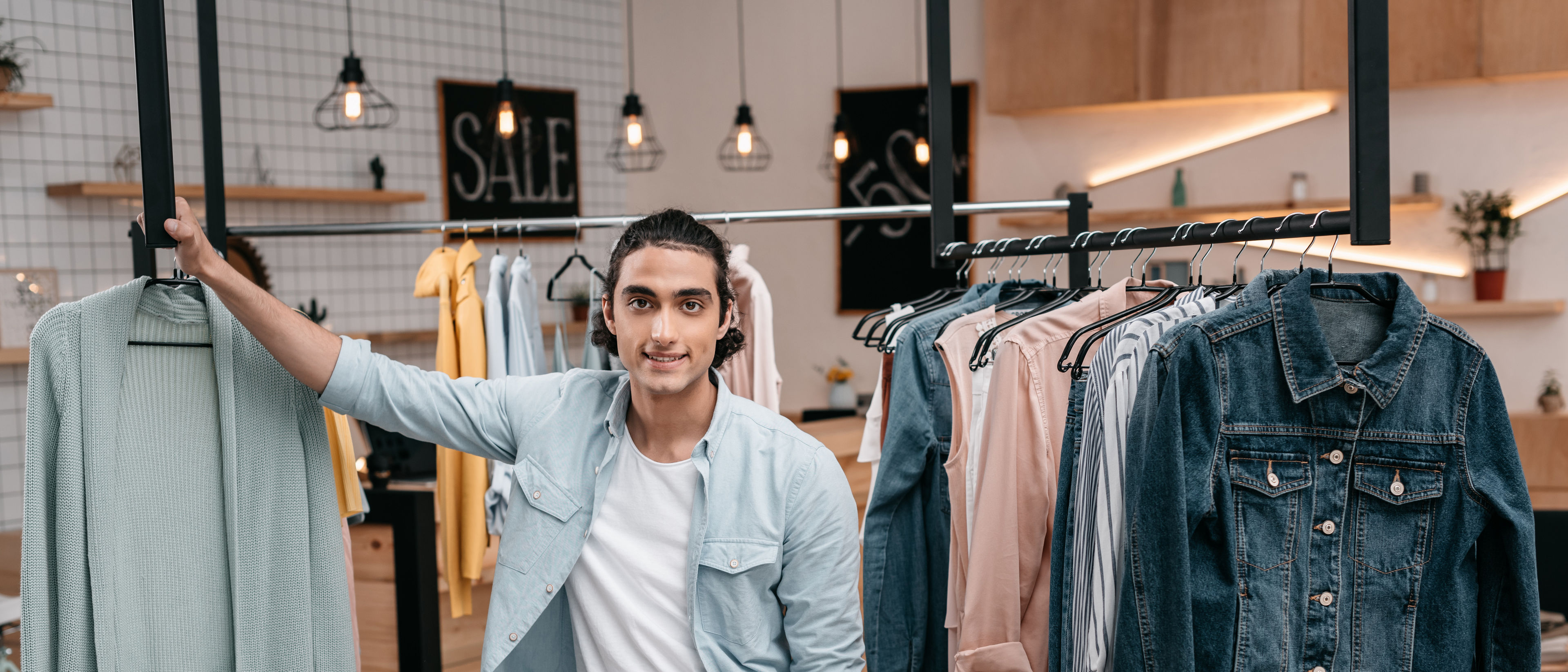 Man holding shirt