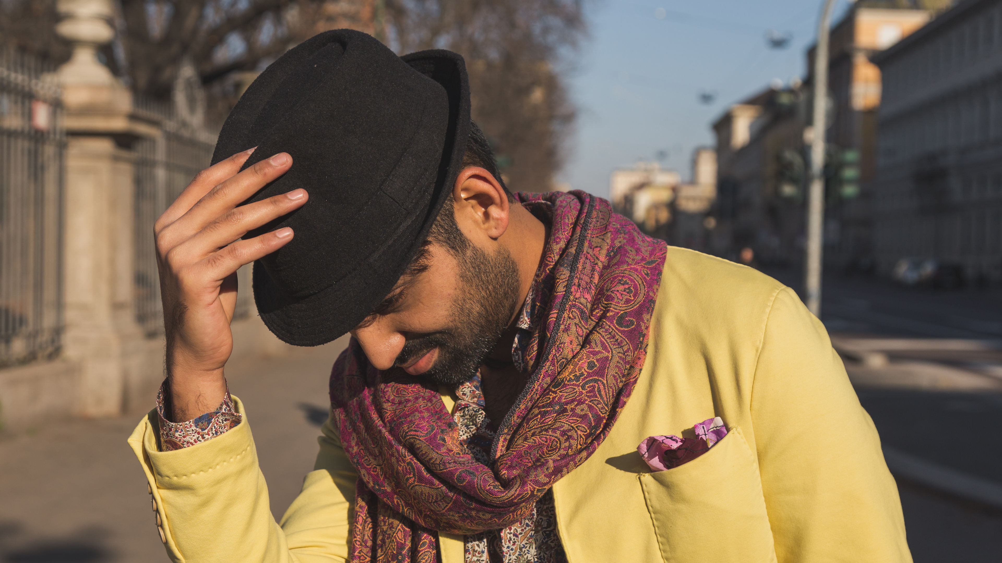 Man Touching the Hat