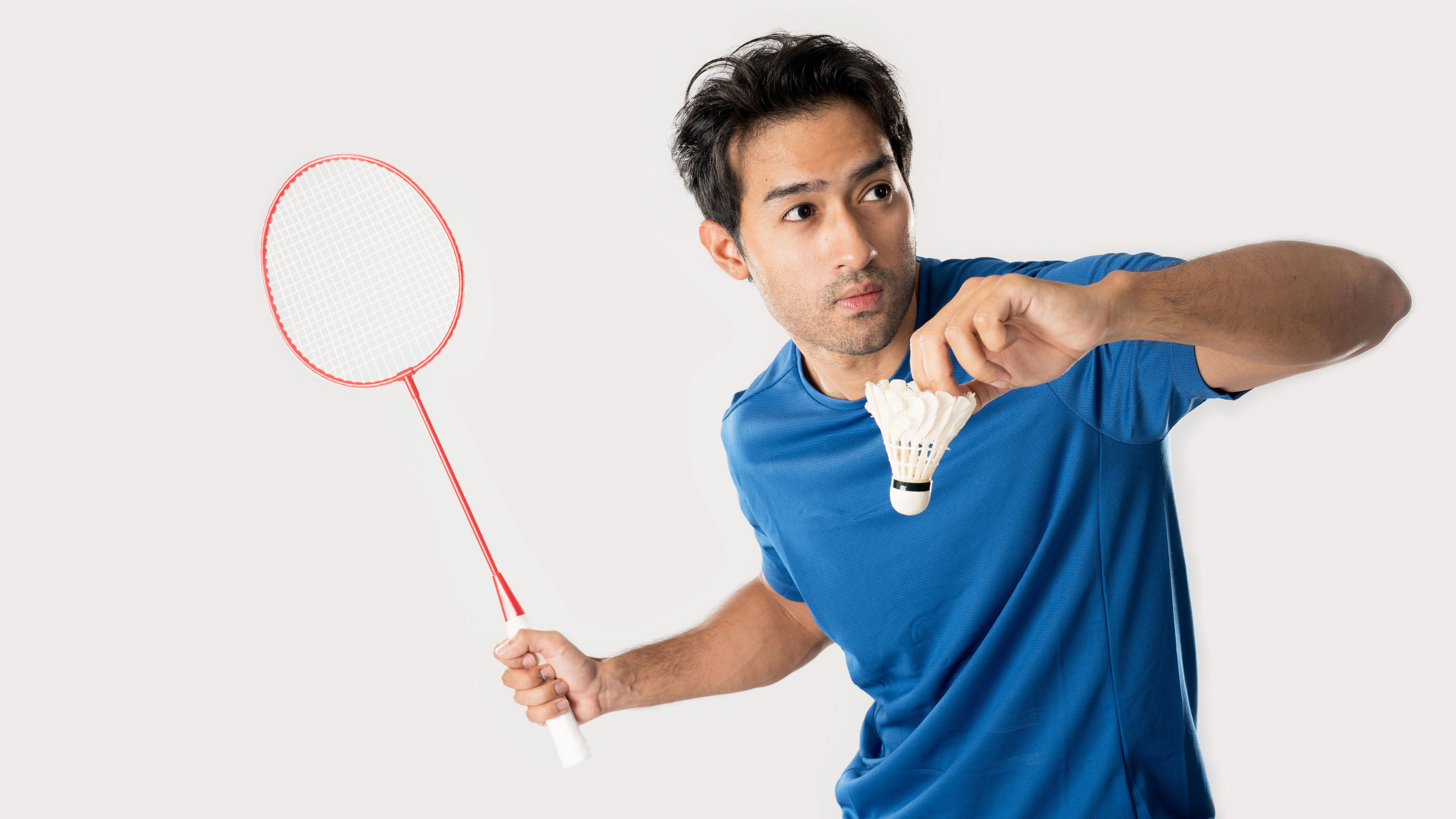Man playing badminton 