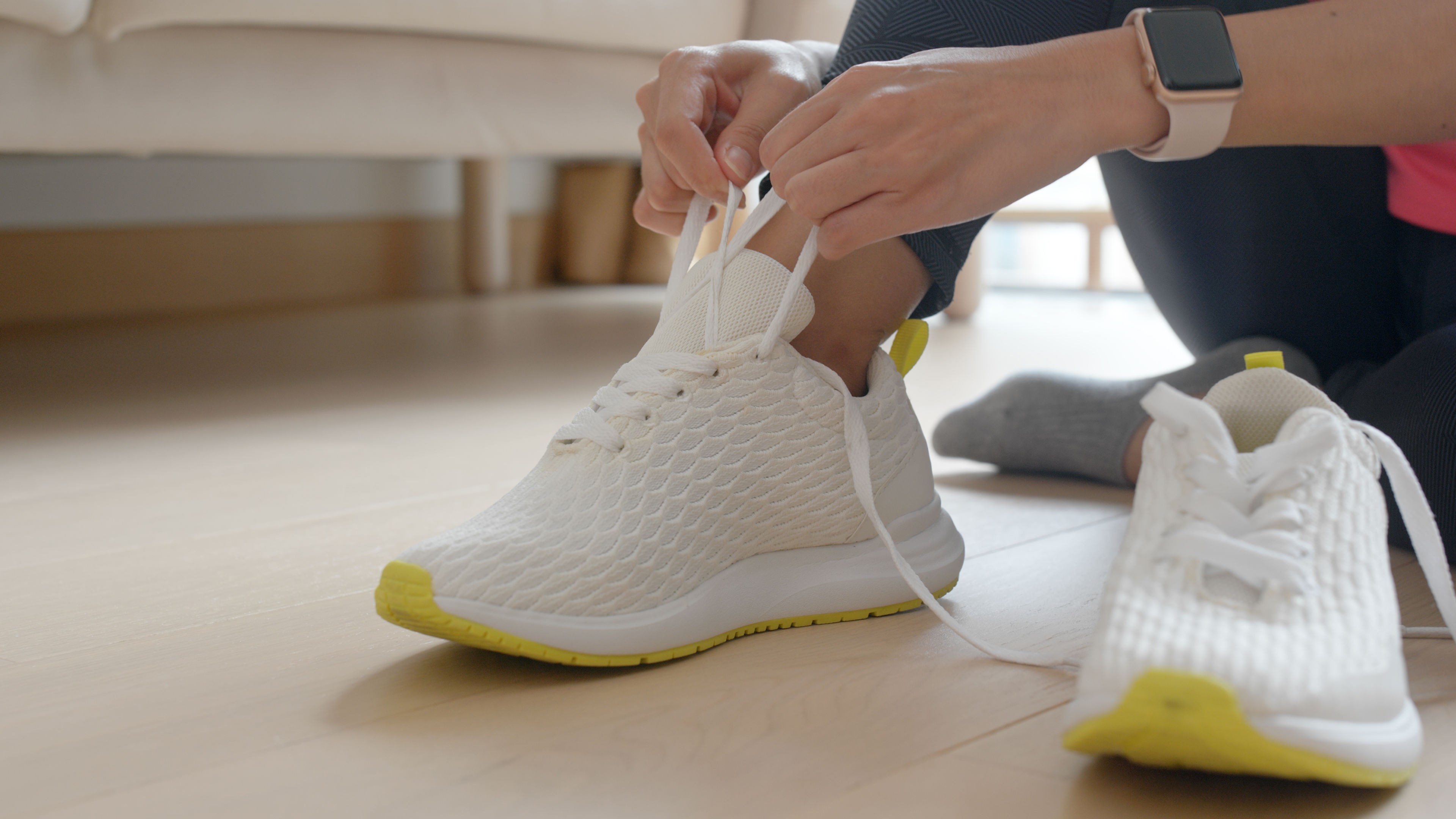 Wearing sport shoes at home for running