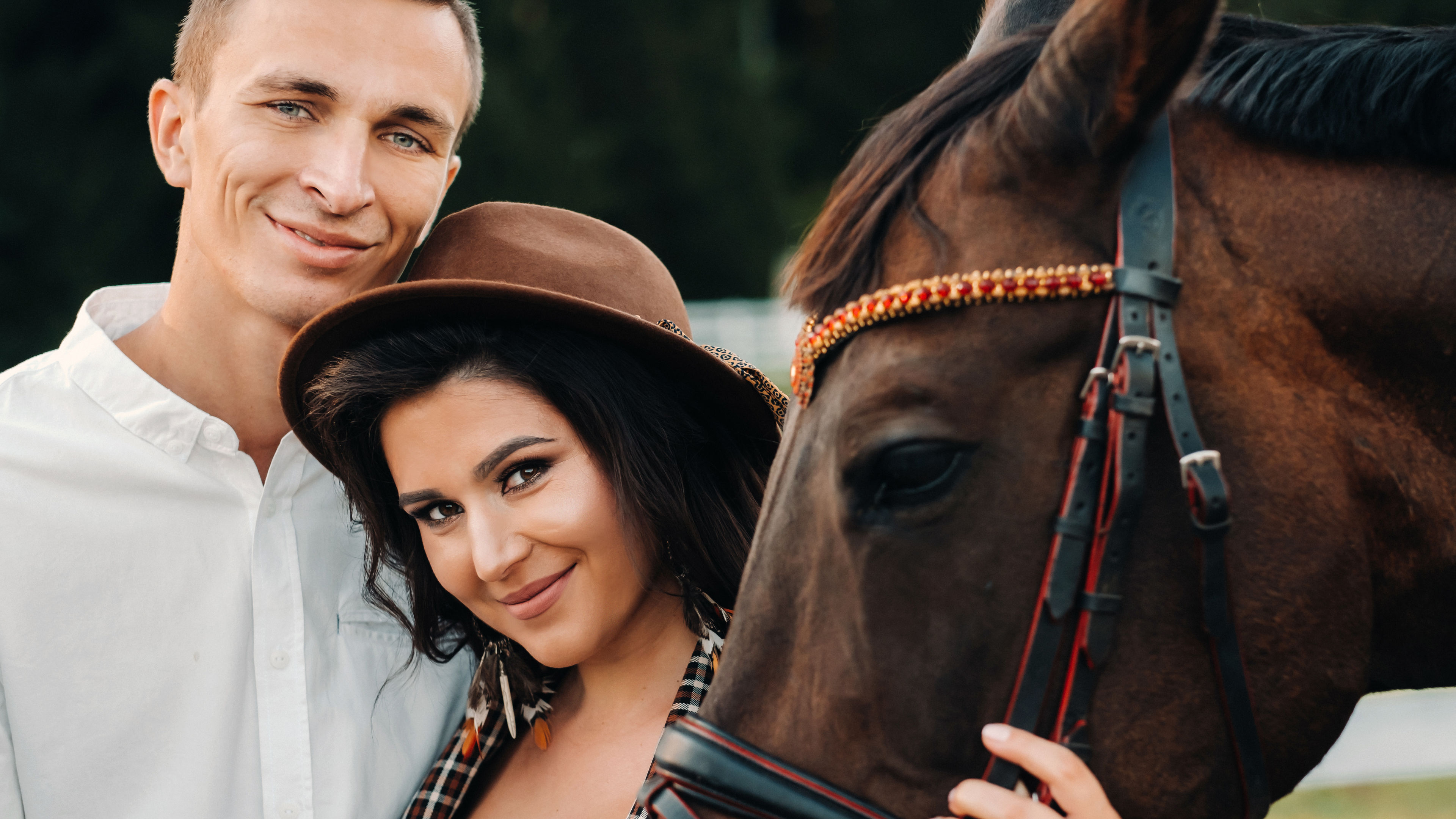 A couple near a horse