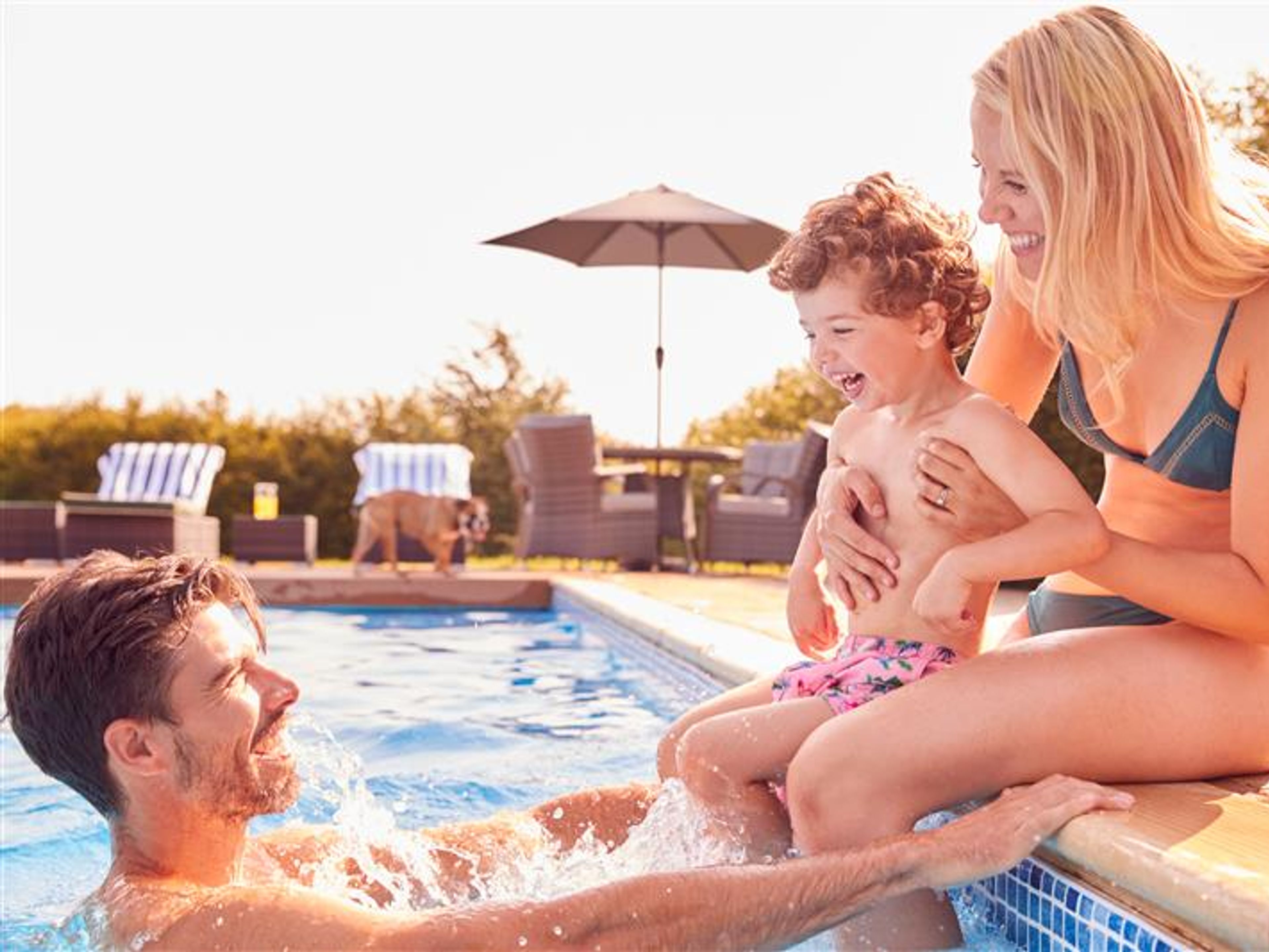 A family enjoying the pool