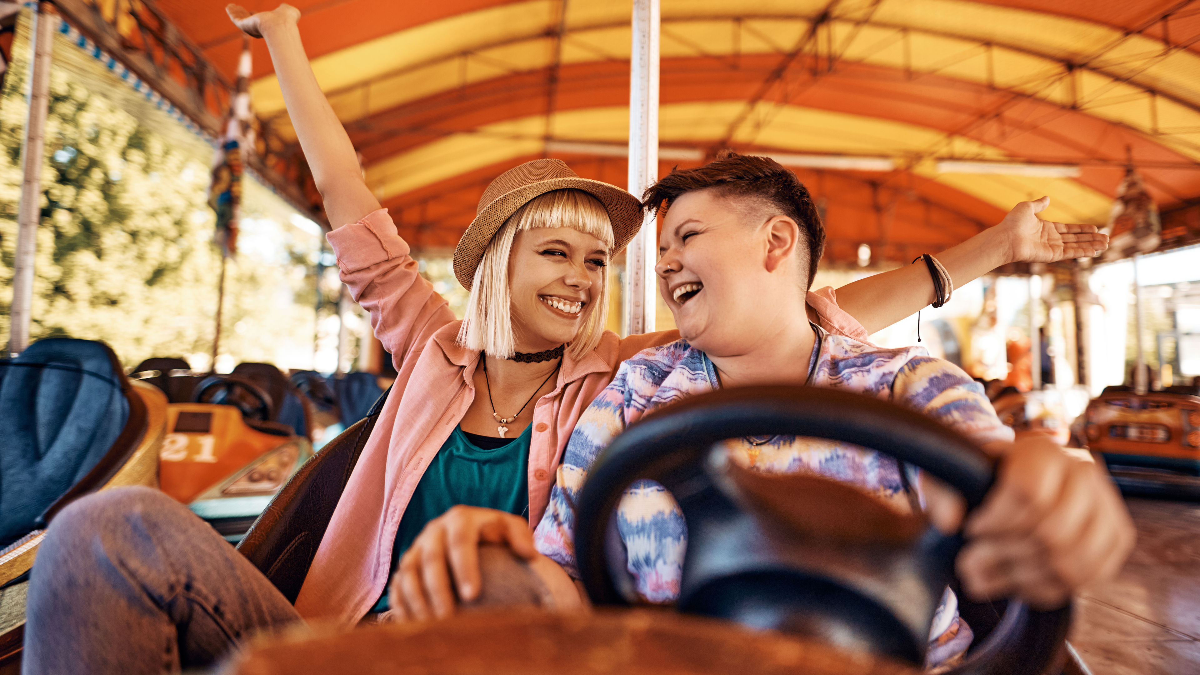 Man and woman enjoying at theme park